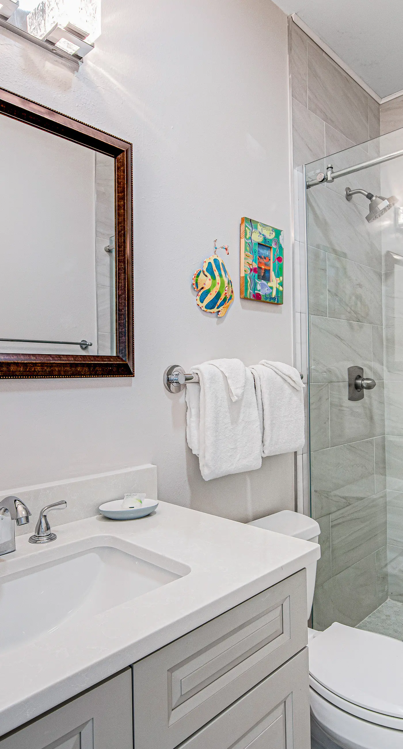 Charming getaway with lovely porches & shared pool - walk to the beach