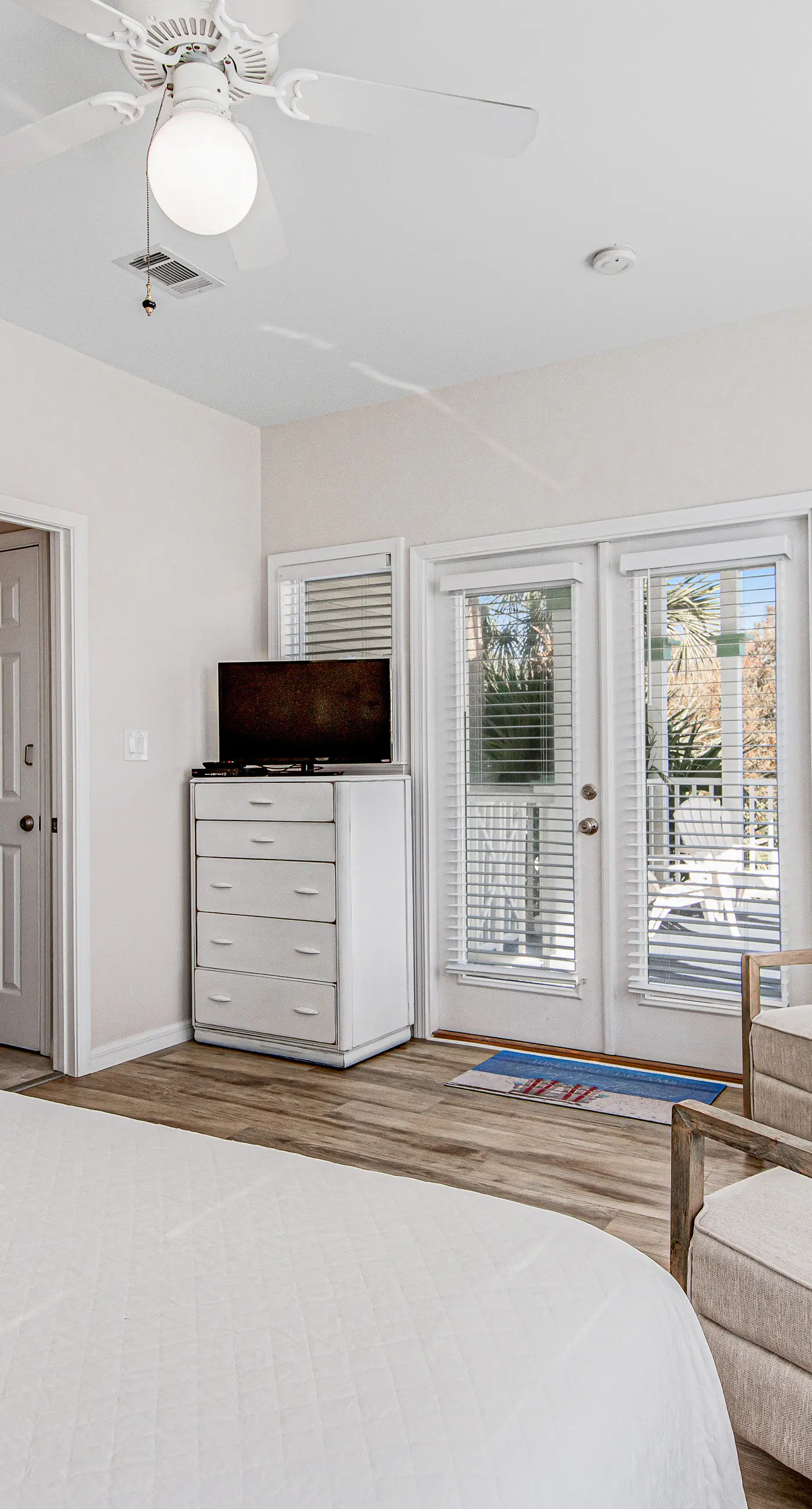 Charming getaway with lovely porches & shared pool - walk to the beach