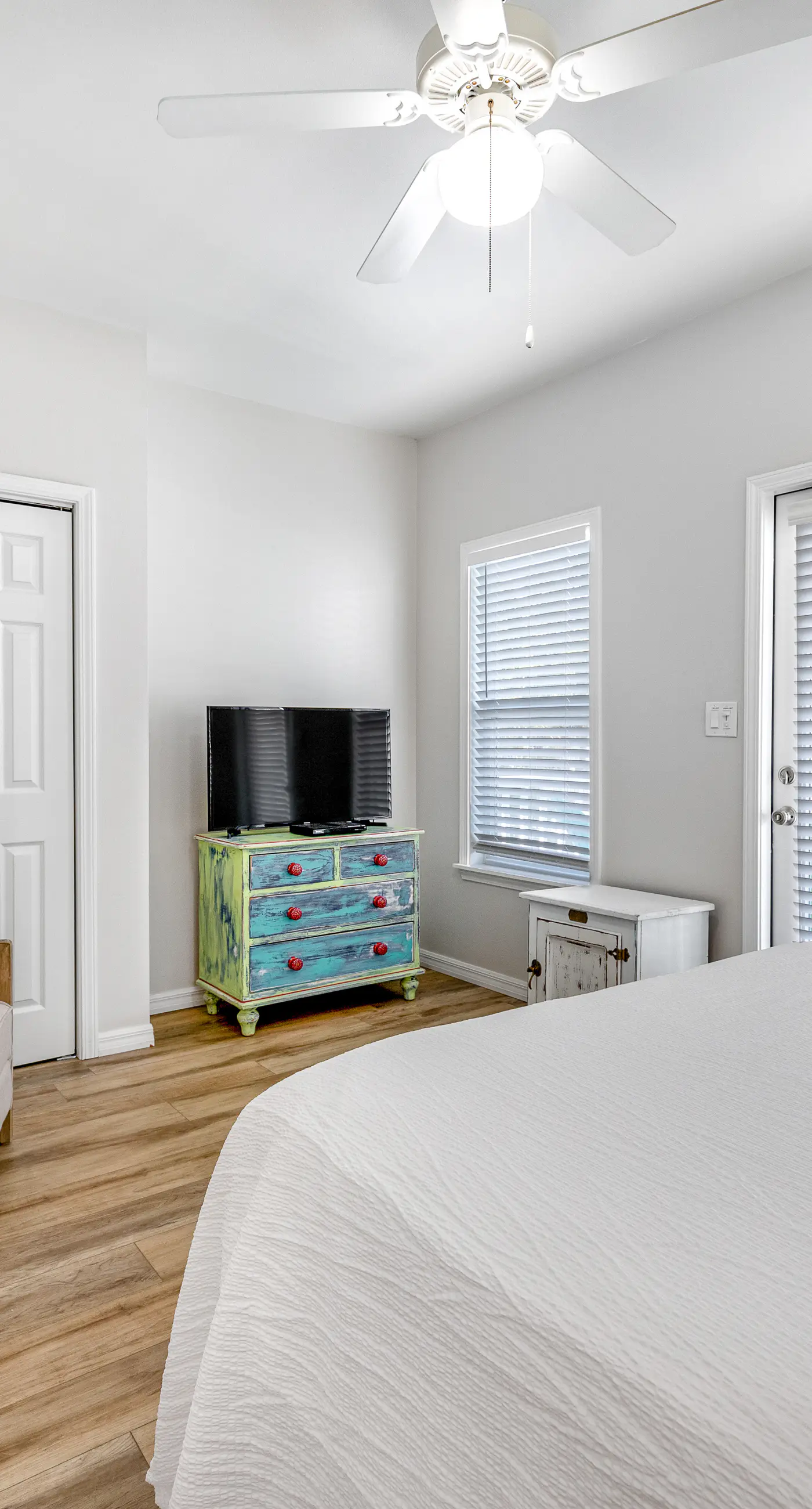 Charming getaway with lovely porches & shared pool - walk to the beach
