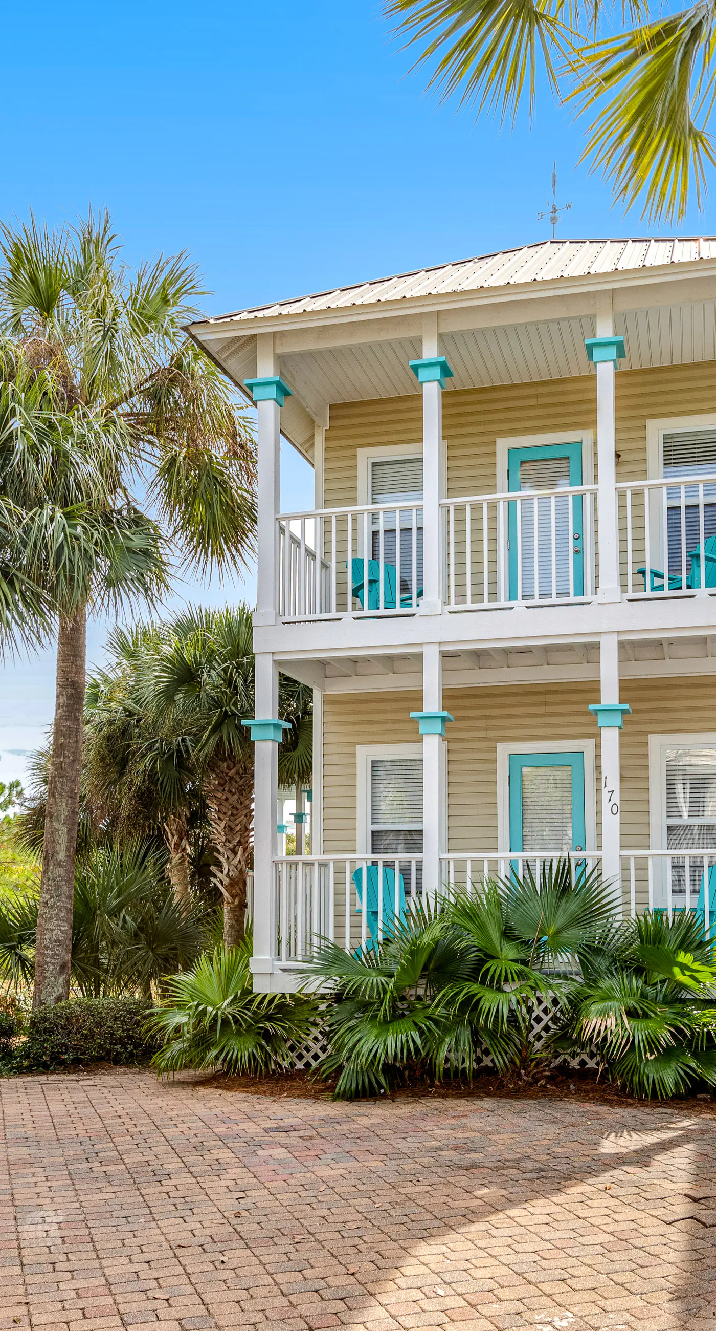 Charming getaway with lovely porches & shared pool - walk to the beach