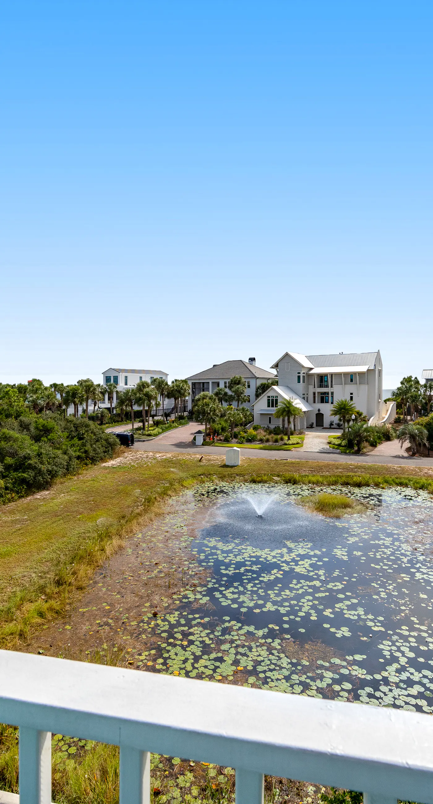 Charming getaway with lovely porches & shared pool - walk to the beach