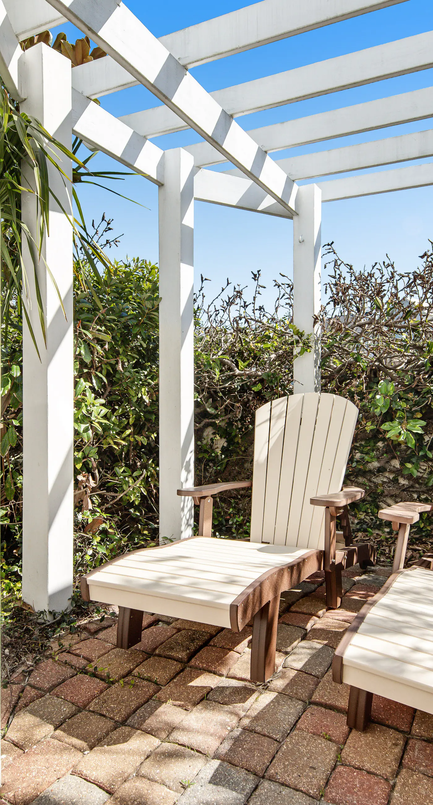 Charming getaway with lovely porches & shared pool - walk to the beach