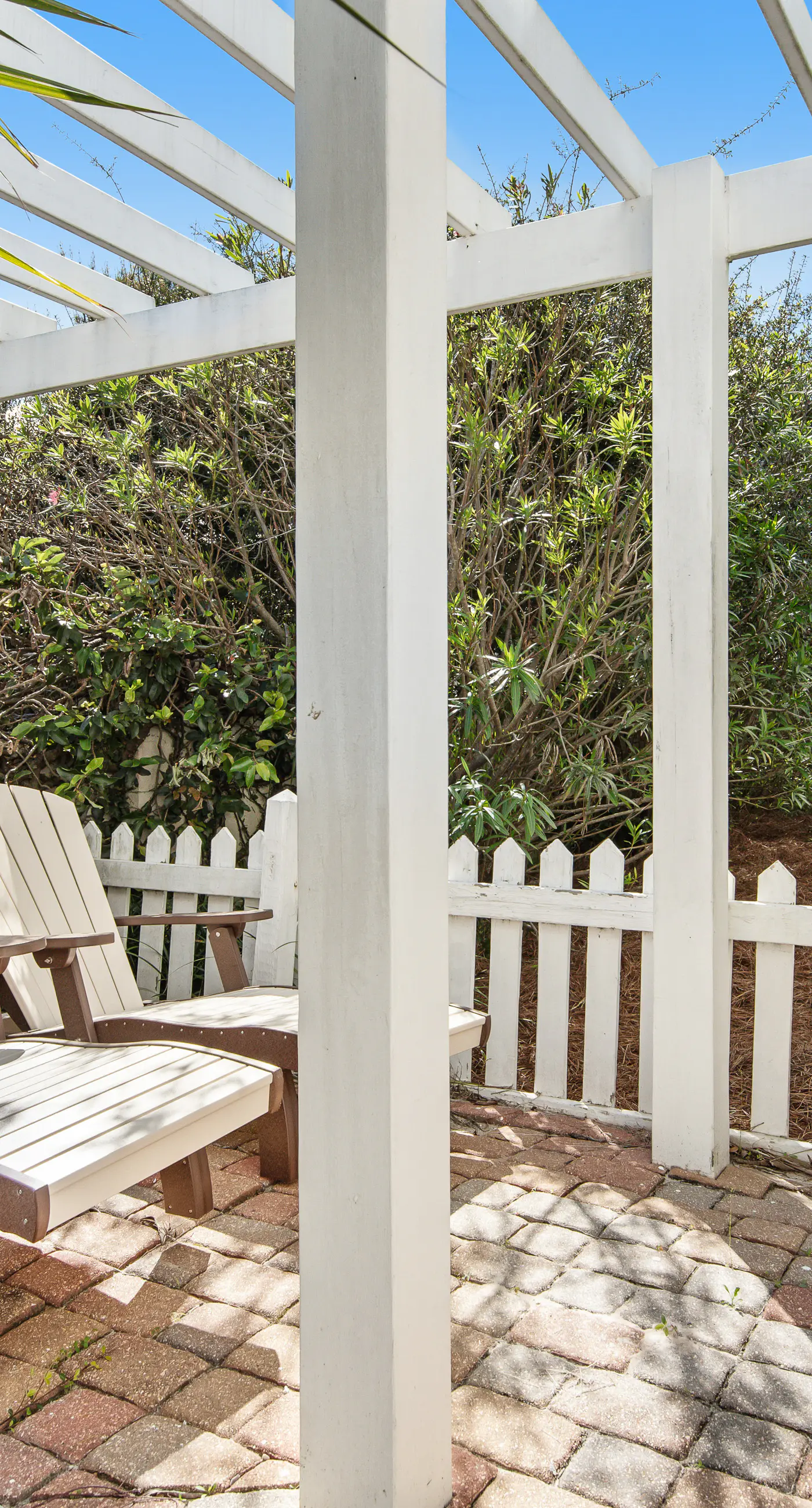 Charming getaway with lovely porches & shared pool - walk to the beach
