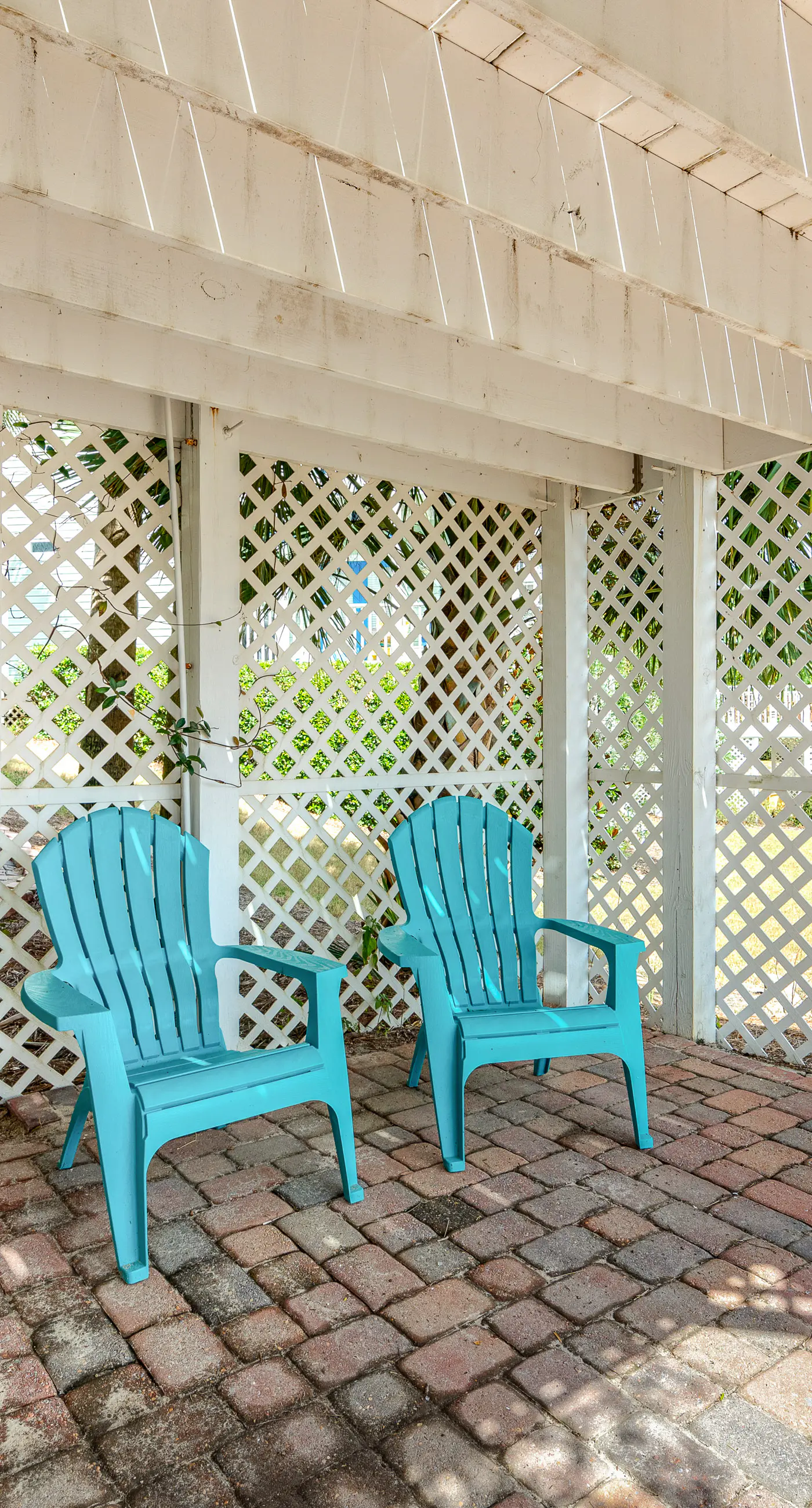 Charming getaway with lovely porches & shared pool - walk to the beach