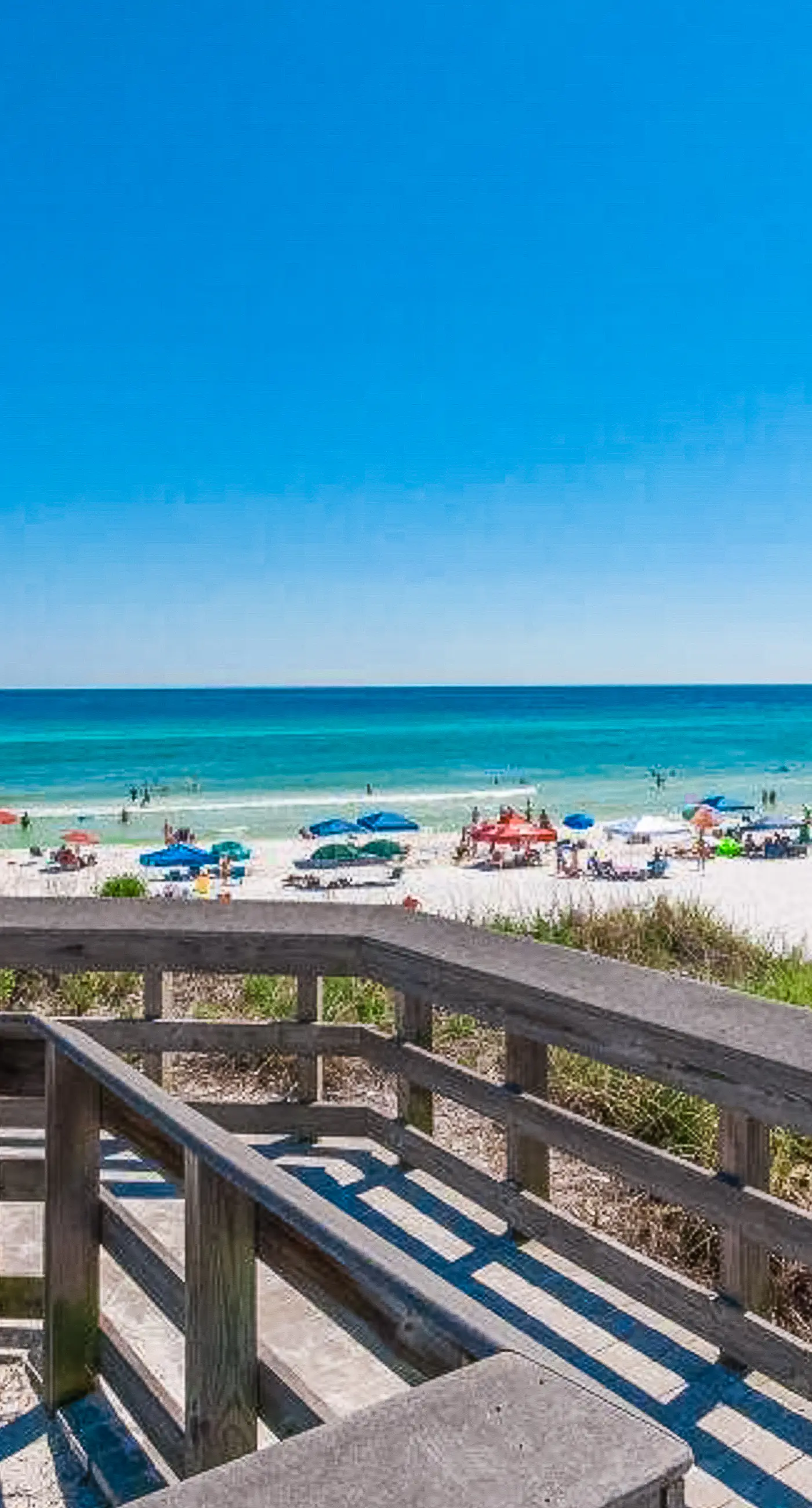 Charming getaway with lovely porches & shared pool - walk to the beach