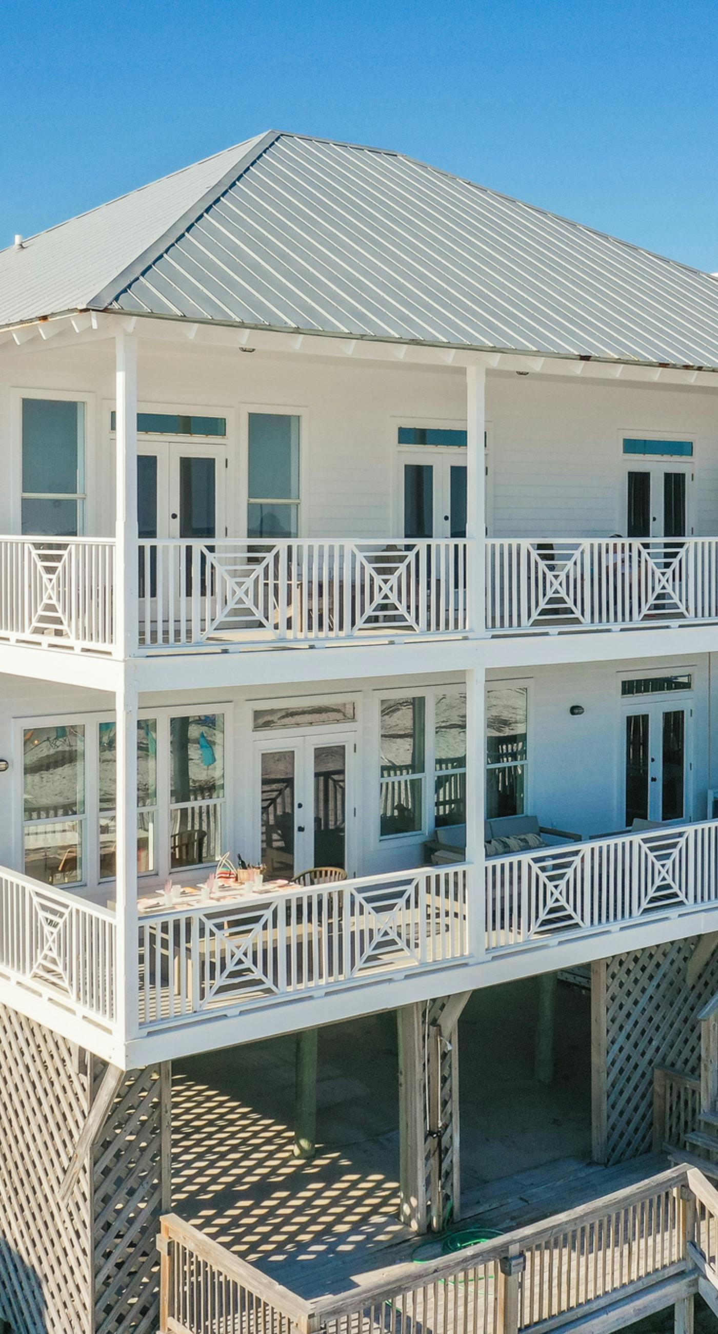 3-story Gulf-front home with beach access, multiple decks, beach views, AC