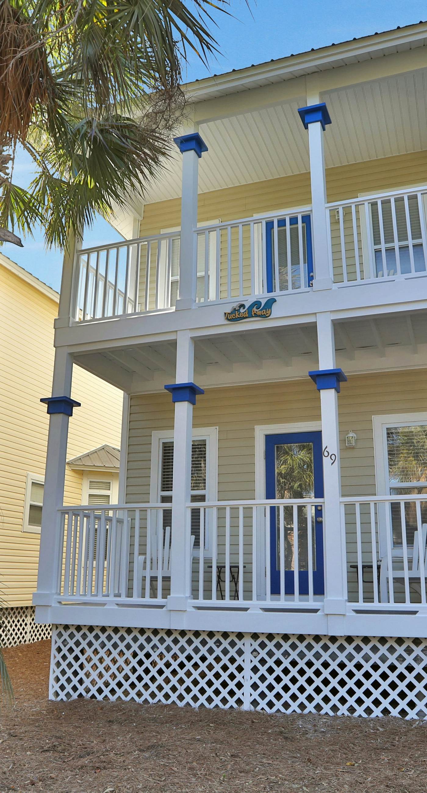 Two-story home near the beach with private balconies & on-site pool