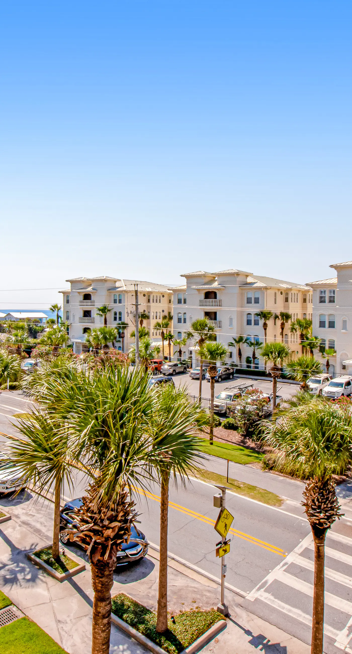 Spacious condo with large living area, private balcony & shared pool