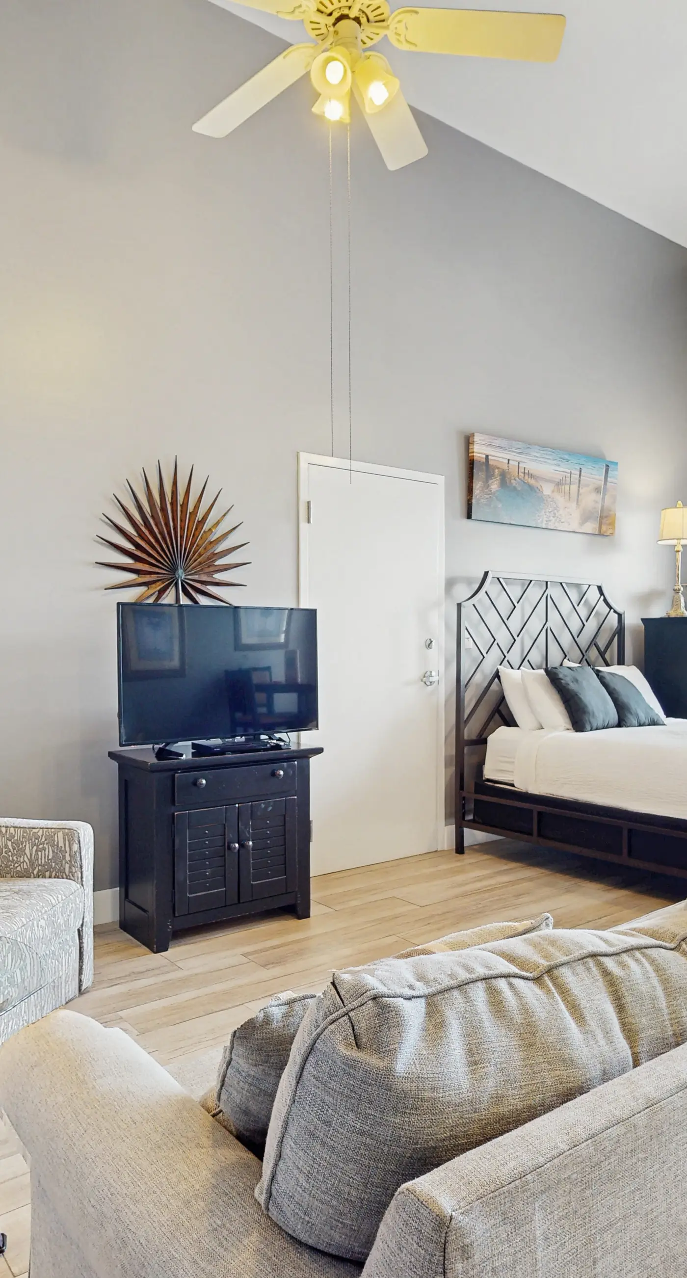 Spacious condo with large living area, private balcony & shared pool