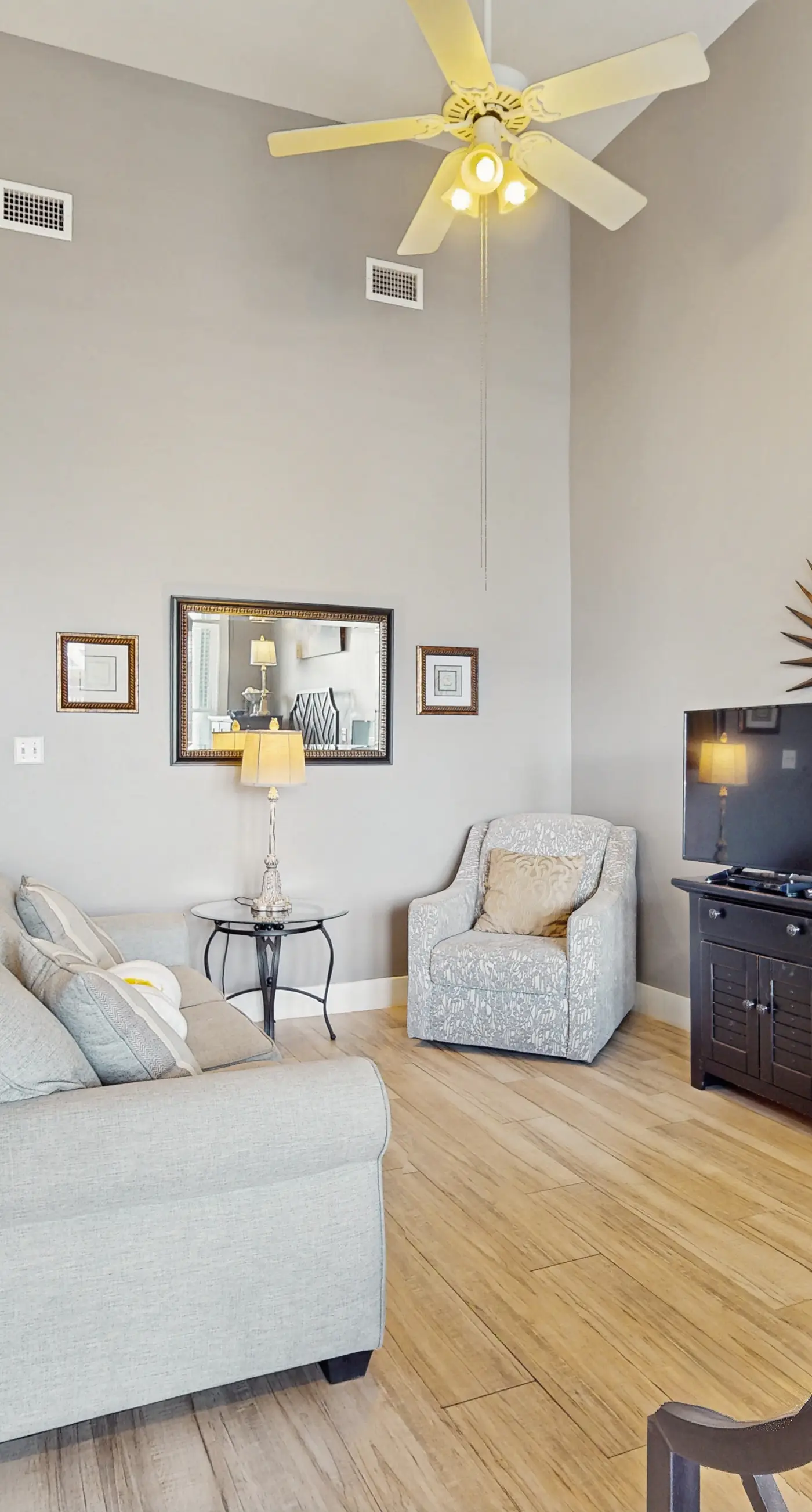 Spacious condo with large living area, private balcony & shared pool