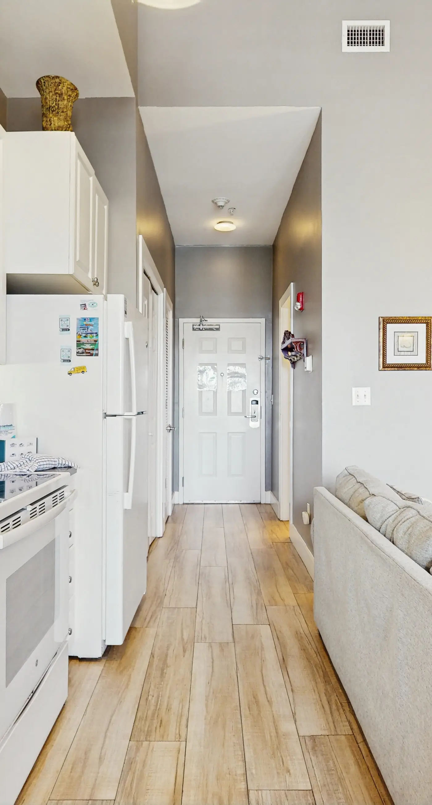 Spacious condo with large living area, private balcony & shared pool