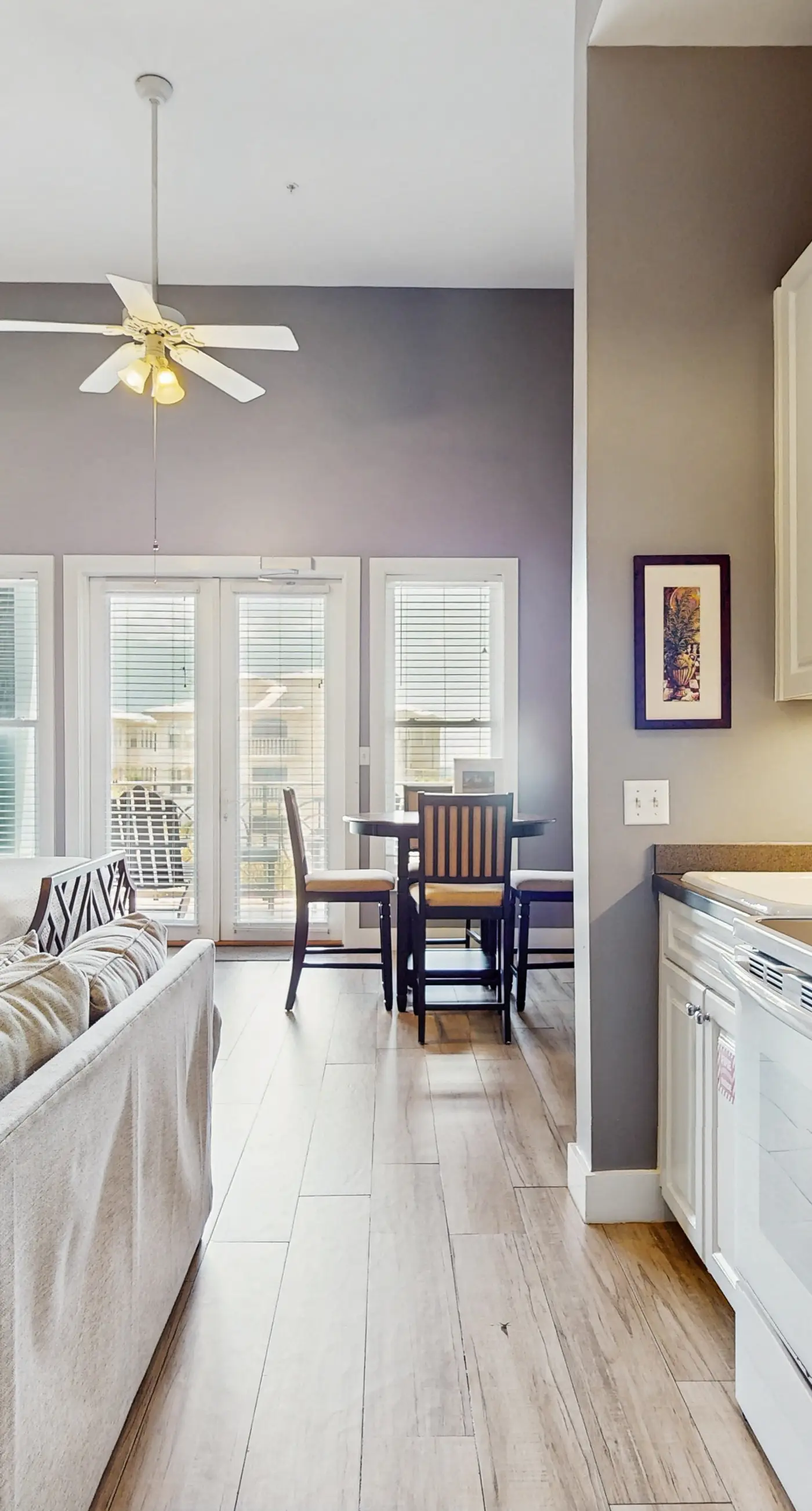 Spacious condo with large living area, private balcony & shared pool