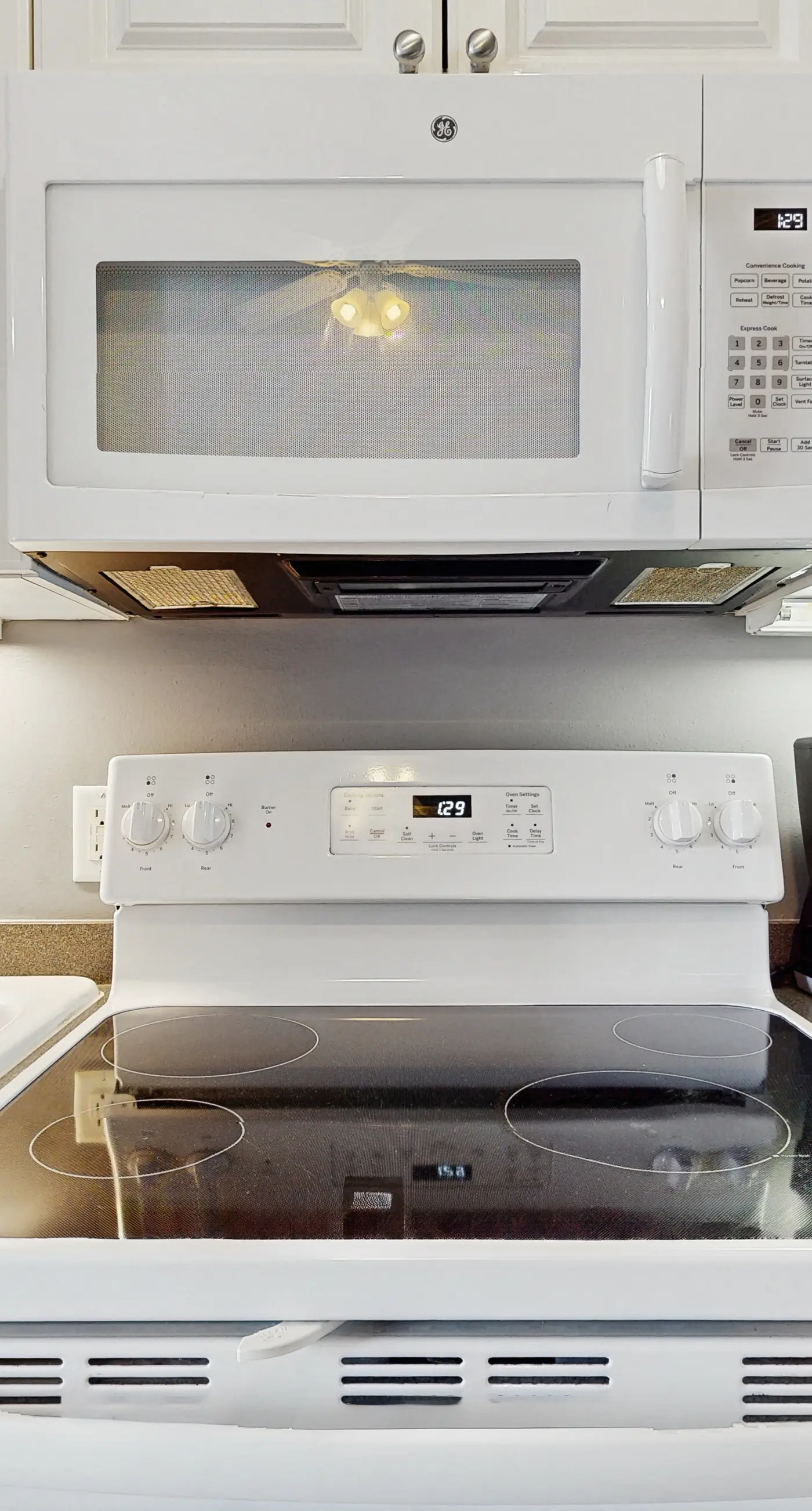 Spacious condo with large living area, private balcony & shared pool