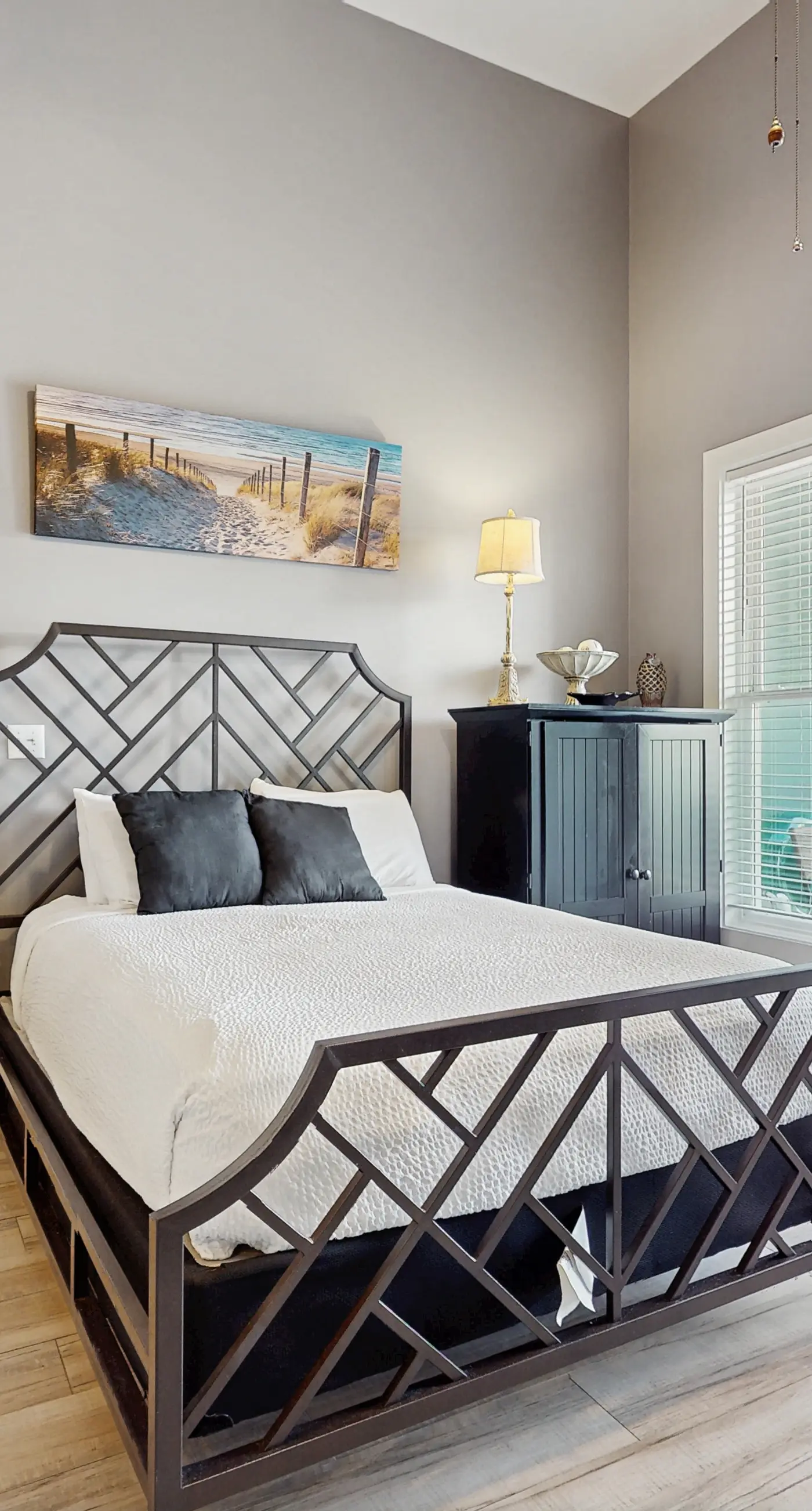 Spacious condo with large living area, private balcony & shared pool