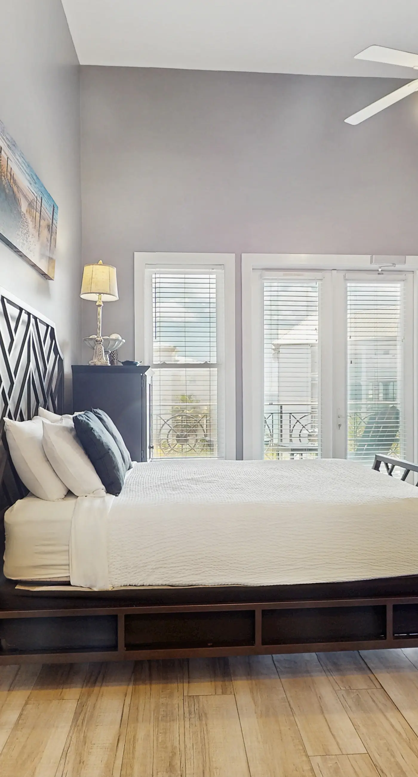 Spacious condo with large living area, private balcony & shared pool