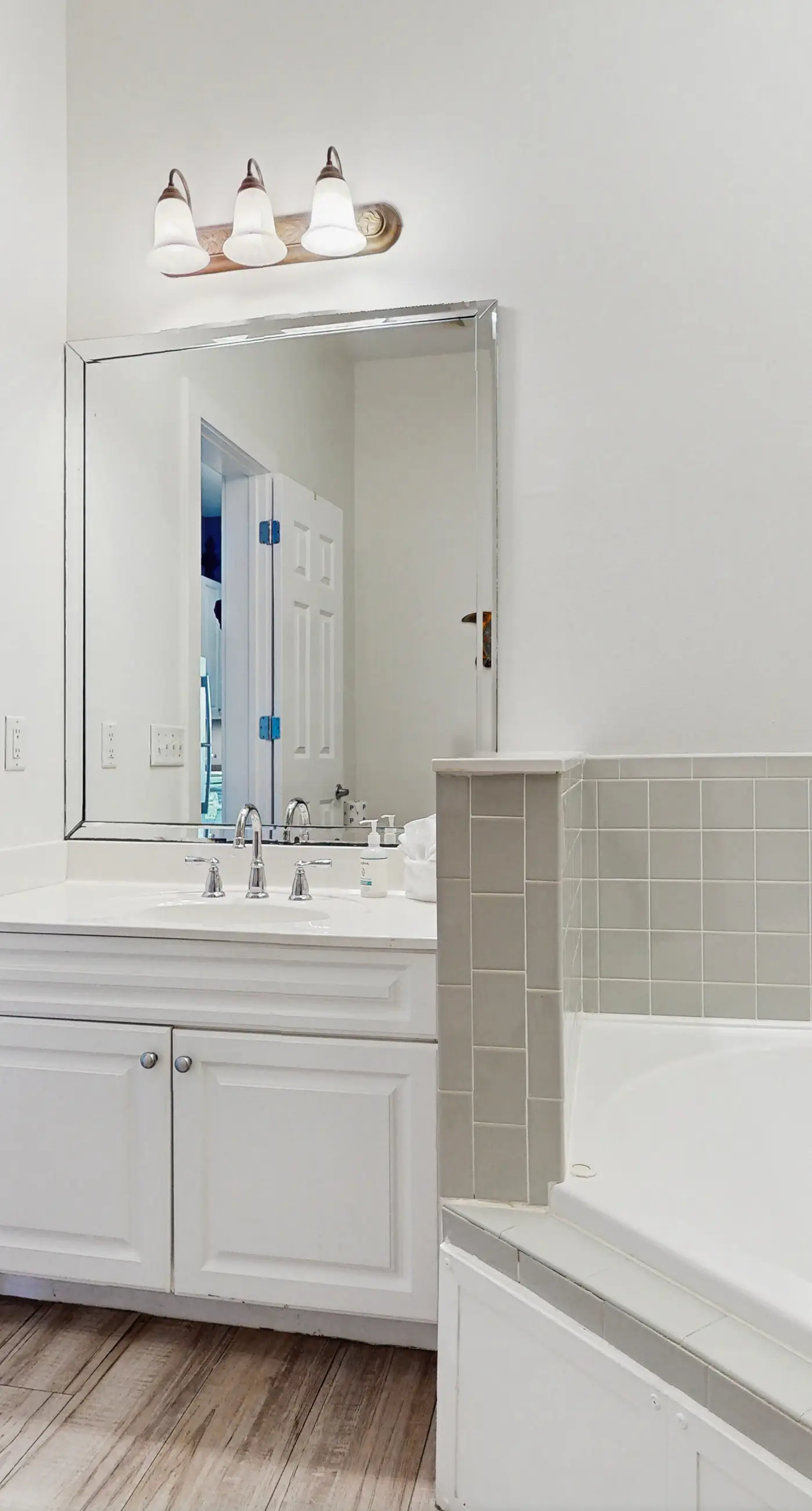 Spacious condo with large living area, private balcony & shared pool