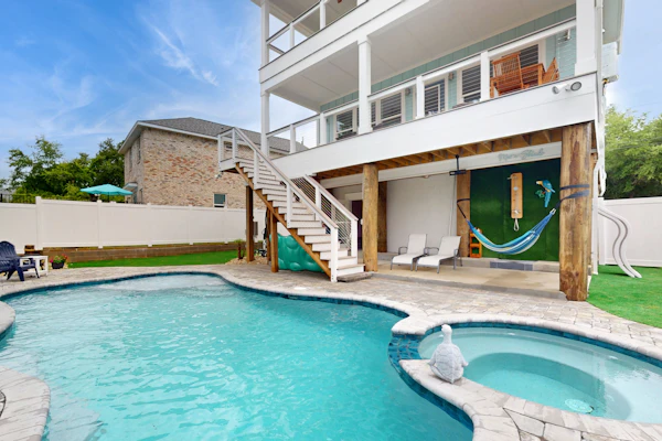Gorgeous coastal home with private pool and close to beach and golf privileges