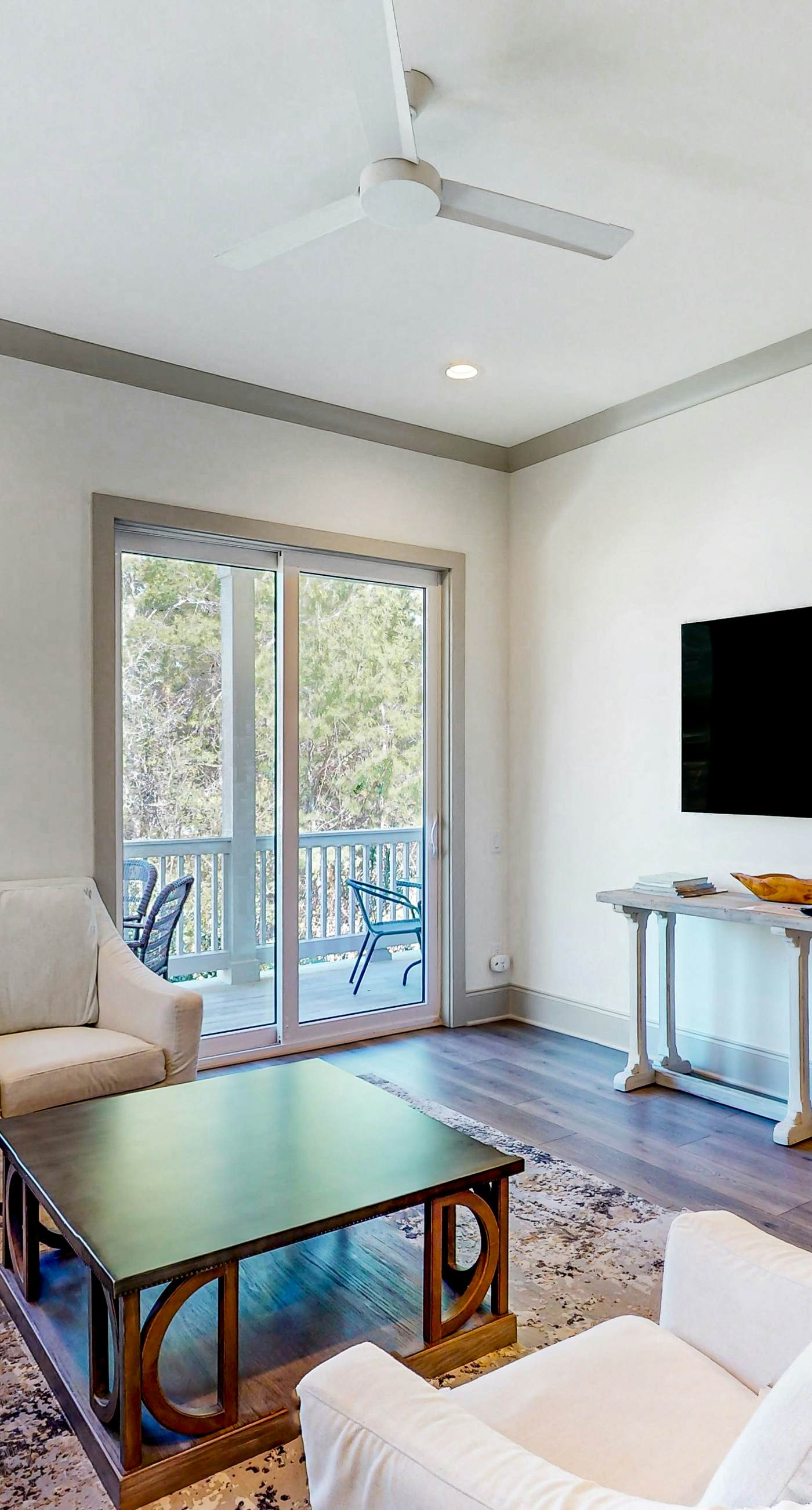 Lake-view condo with a pool, hot tub, & balcony - walking distance to beach