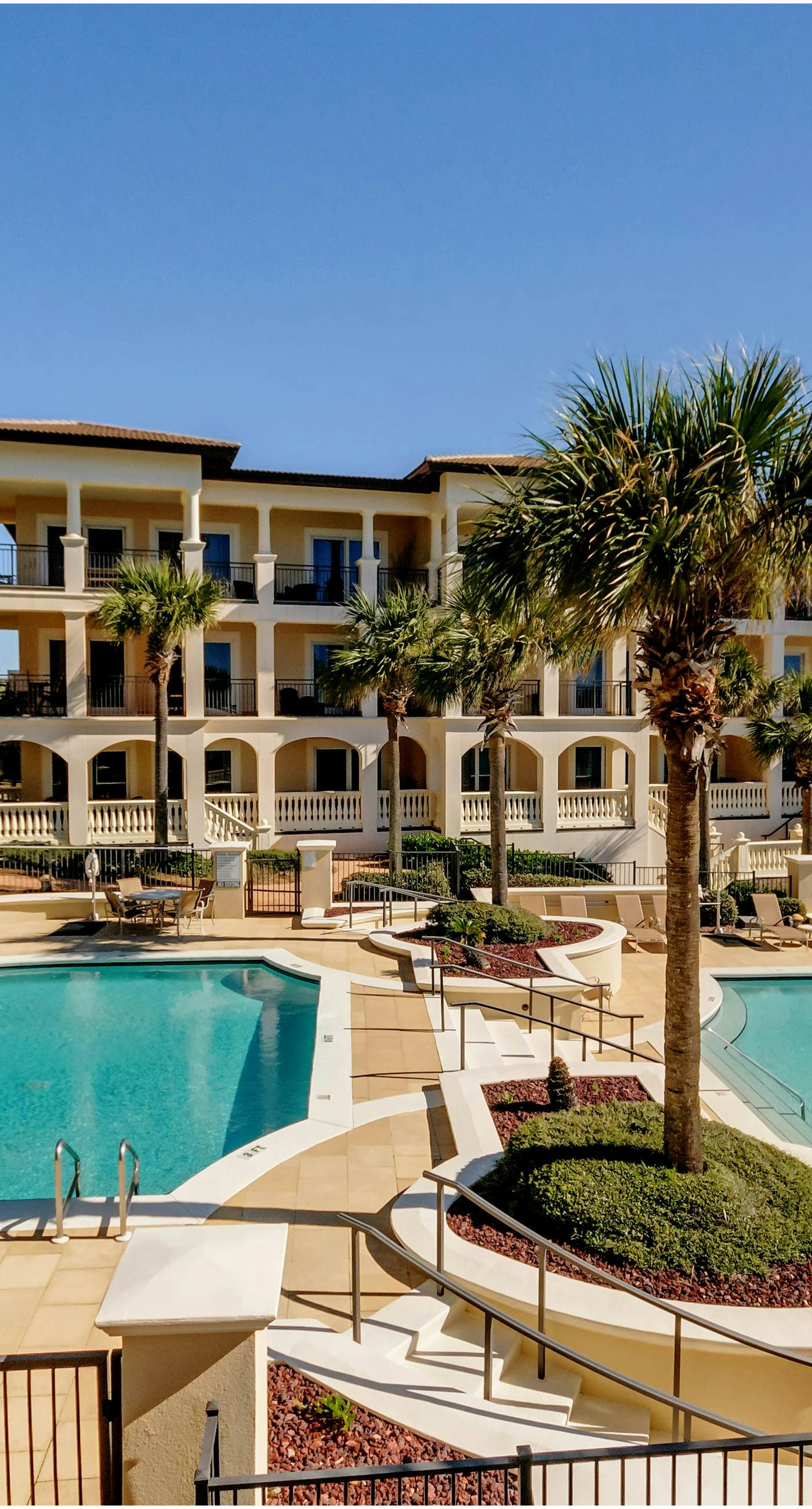 Charming Gulf front condo with courtyard, pool access, & full gulf view