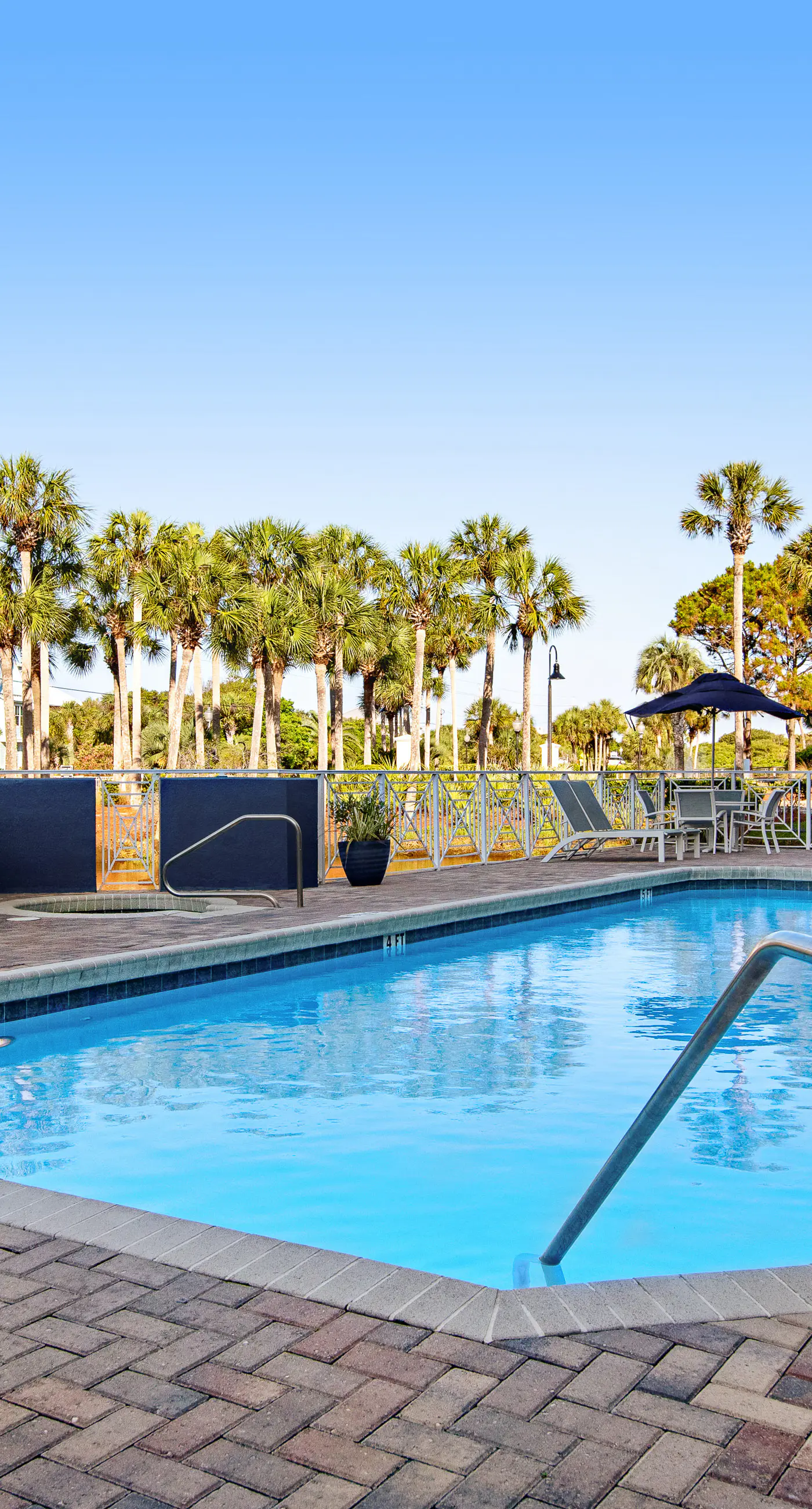 Newly built condo with WiFi, shared pools, hot tub, & private beach access
