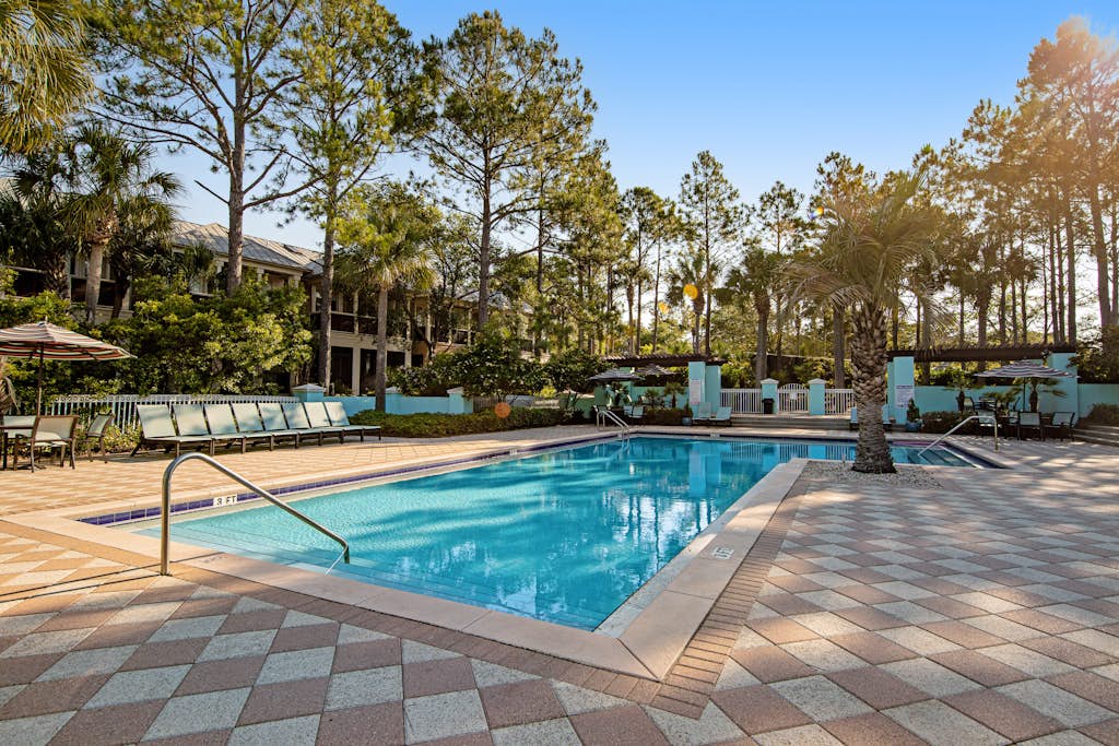 Newly built condo with WiFi, shared pools, hot tub, & private beach access
