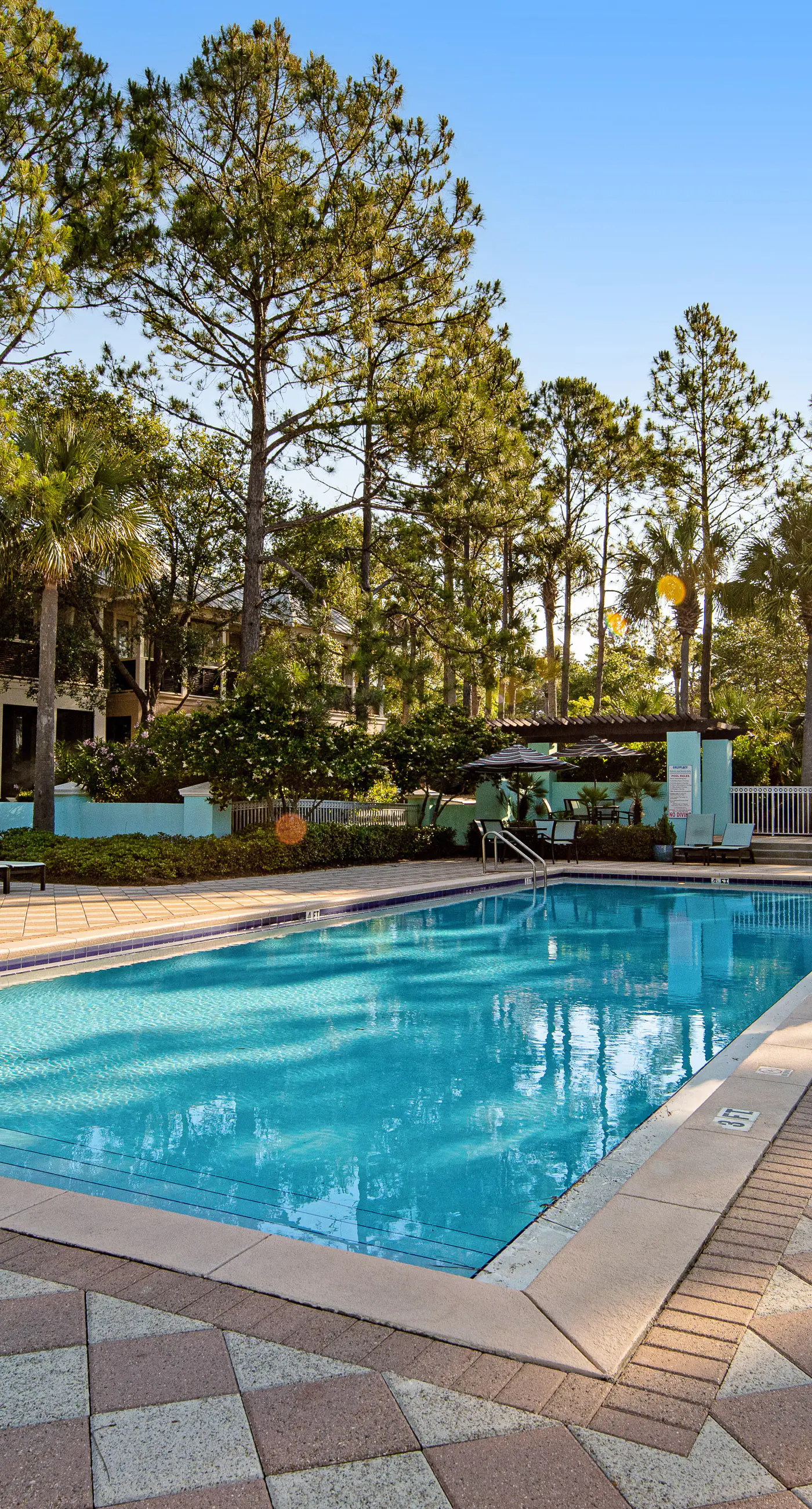 Newly built condo with WiFi, shared pools, hot tub, & private beach access