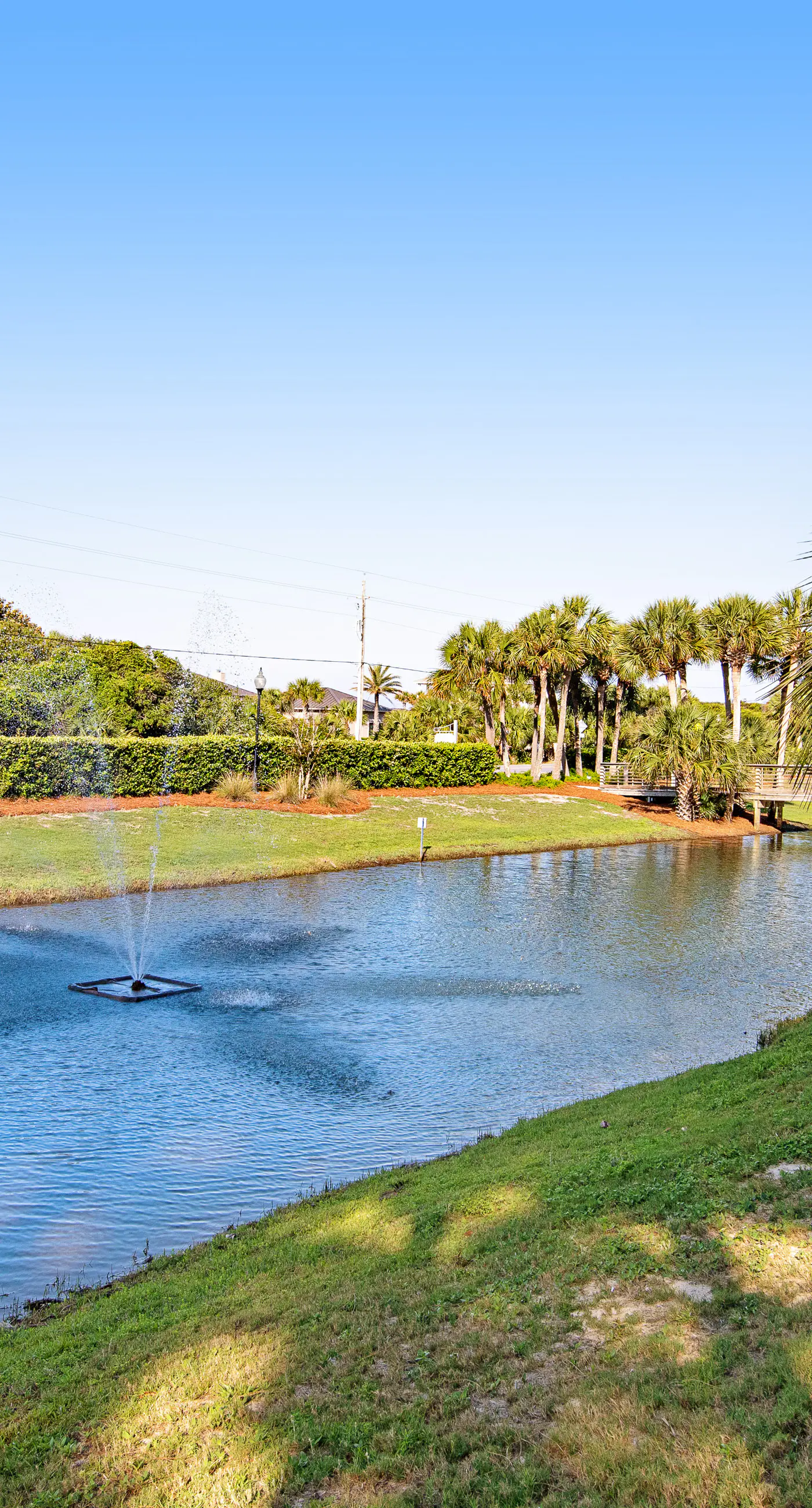 Newly built condo with WiFi, shared pools, hot tub, & private beach access