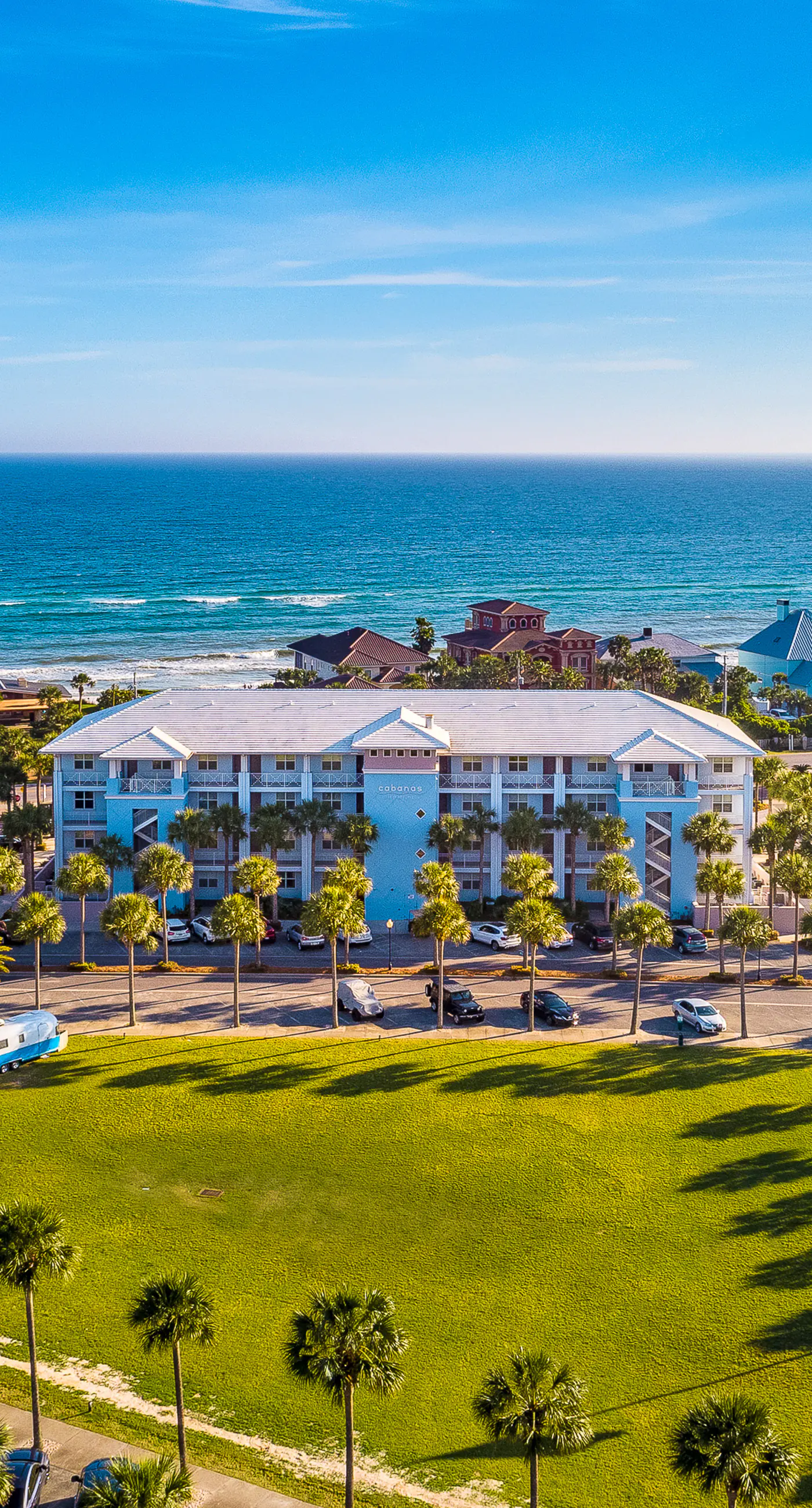 Newly built condo with WiFi, shared pools, hot tub, & private beach access