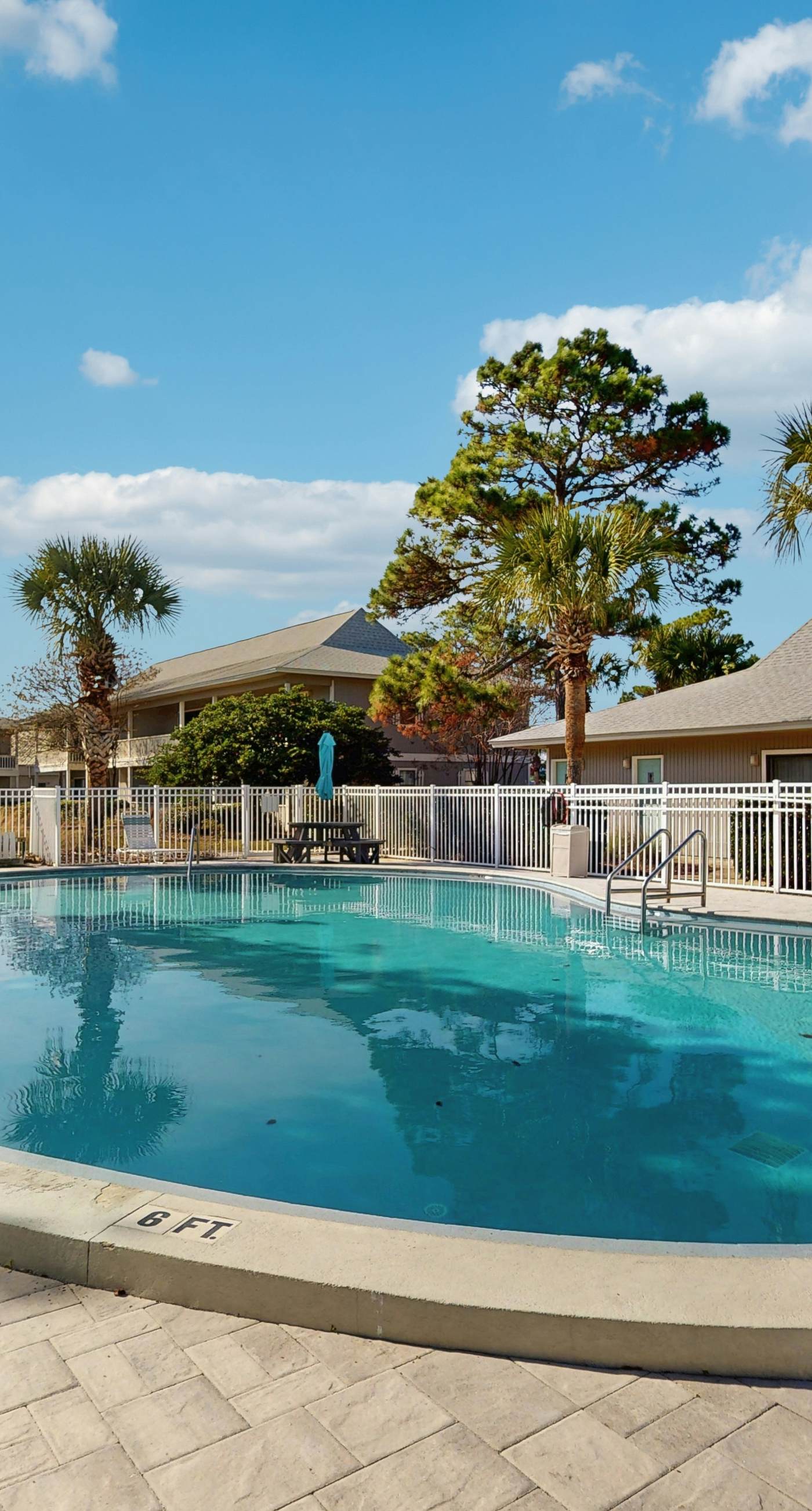Cozy coastal condo, dog friendly with shared pool and close to beach