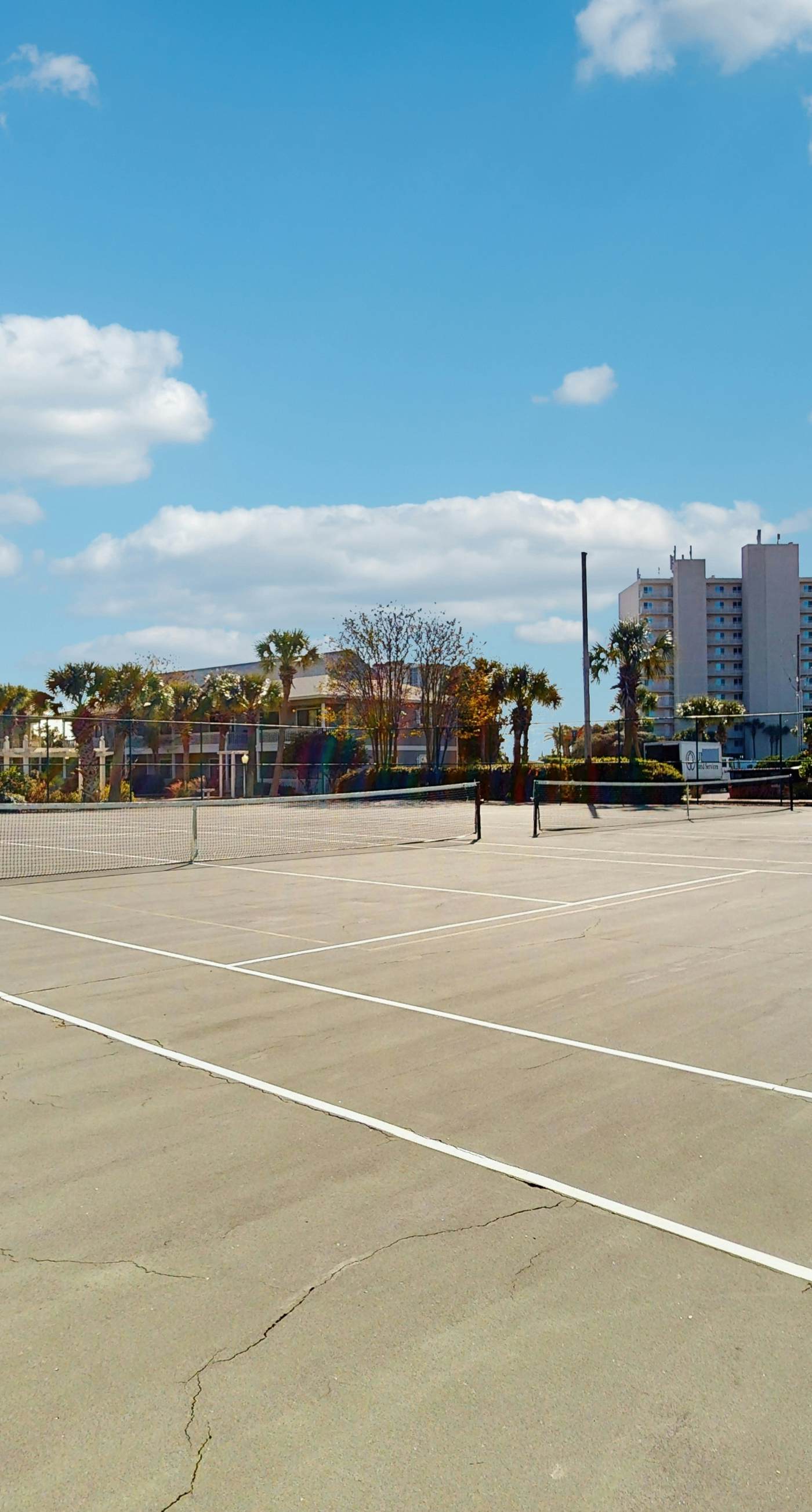 Cozy coastal condo, dog friendly with shared pool and close to beach