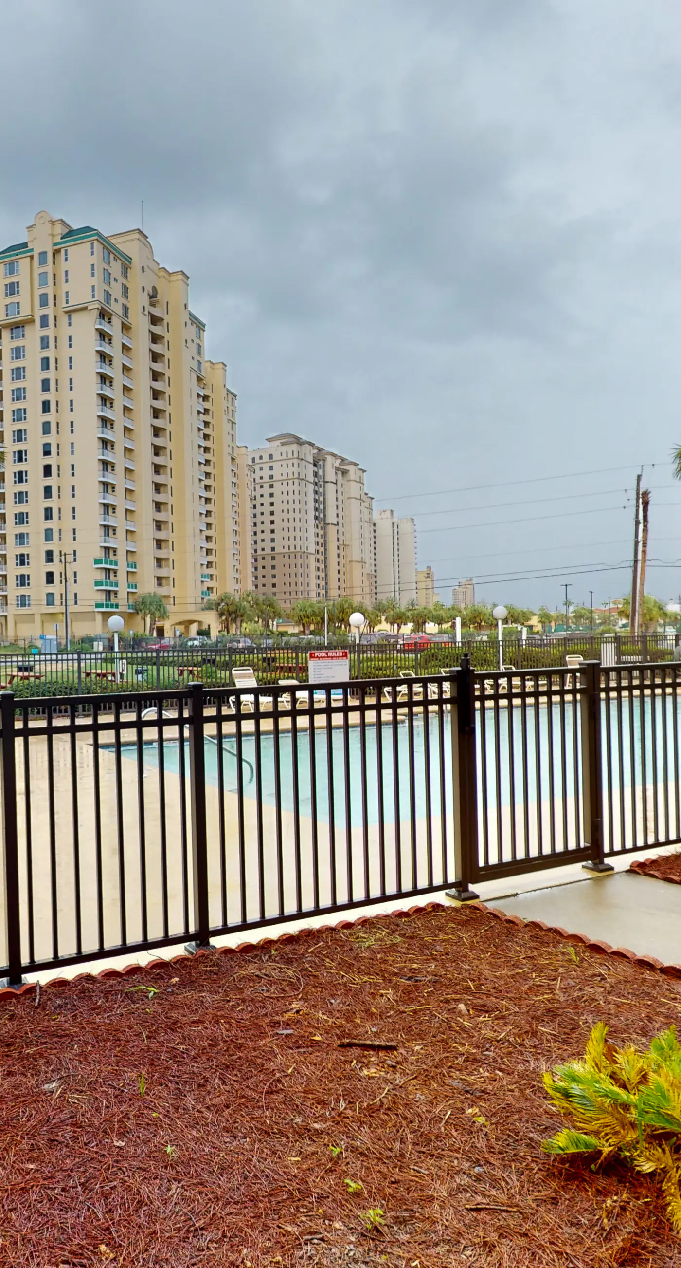 Ground-floor condo with pool, hot tub, & patio - walk to beach