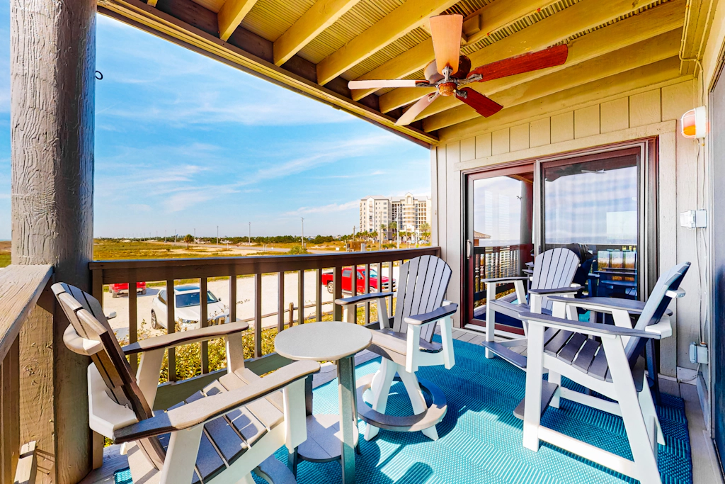 Ideally located coastal condo with Gulf views, private balcony & beach access
