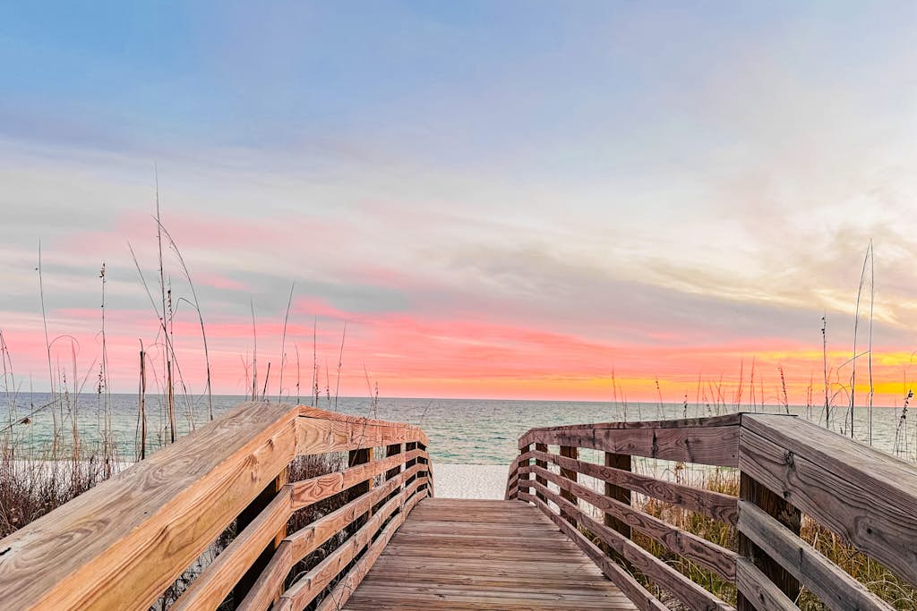 Ideally located coastal condo with Gulf views, private balcony & beach access