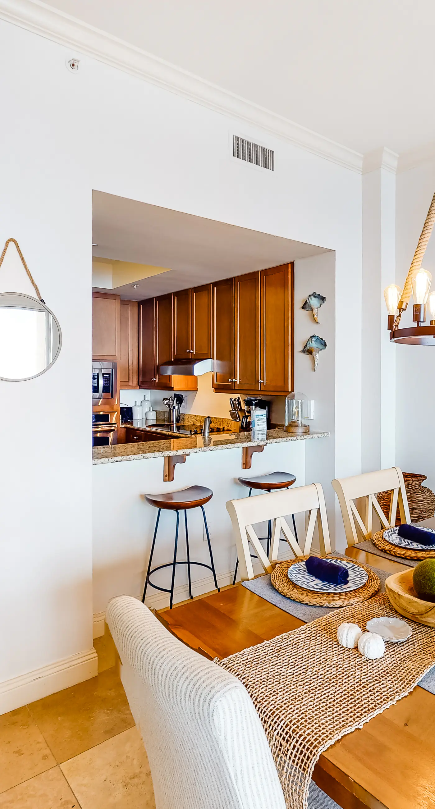 Updated oceanfront penthouse with sunset balcony views, pool, hot tub & gym