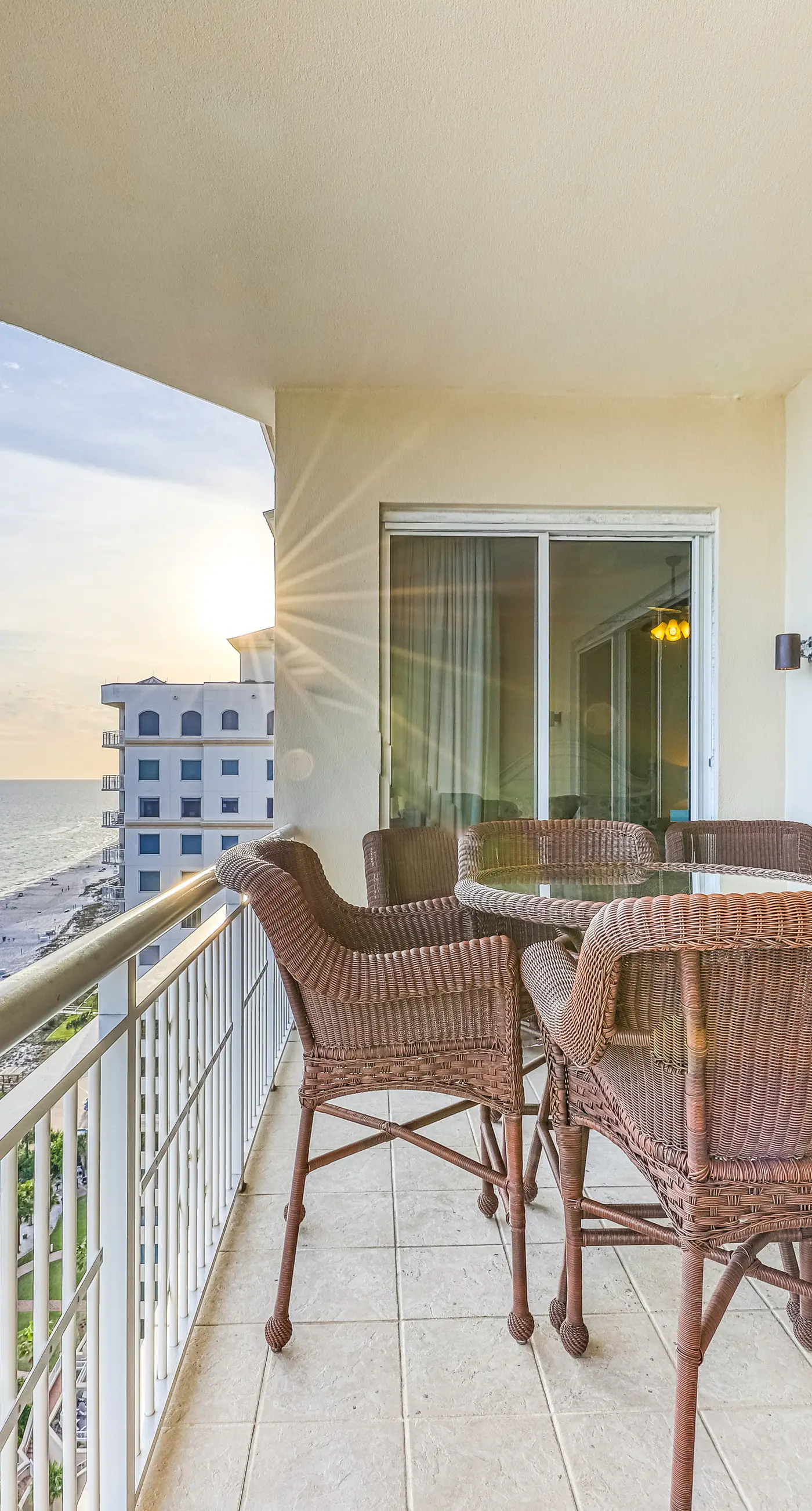 Updated oceanfront penthouse with sunset balcony views, pool, hot tub & gym