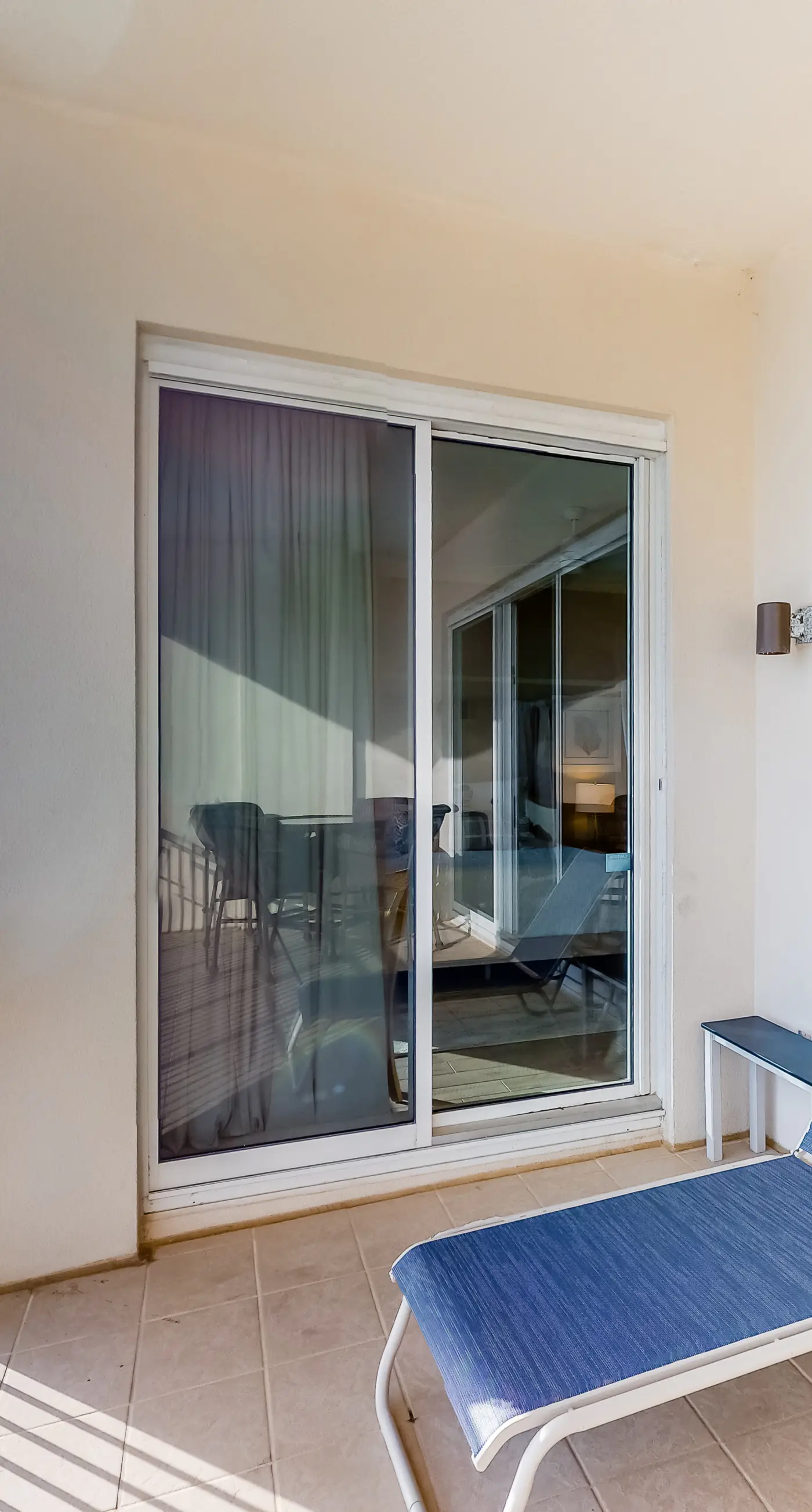 Updated oceanfront penthouse with sunset balcony views, pool, hot tub & gym