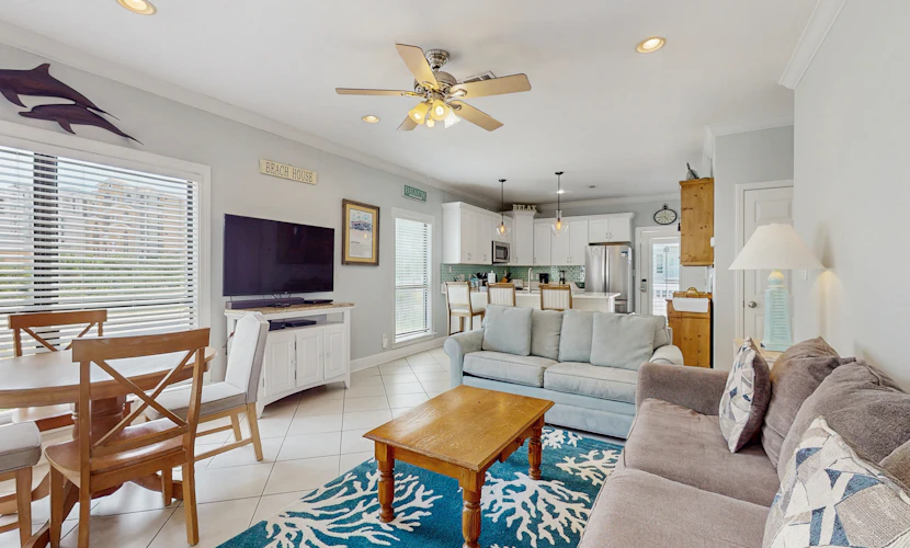 Gorgeous coastal townhome with private balcony/porch, W/D, and shared pool