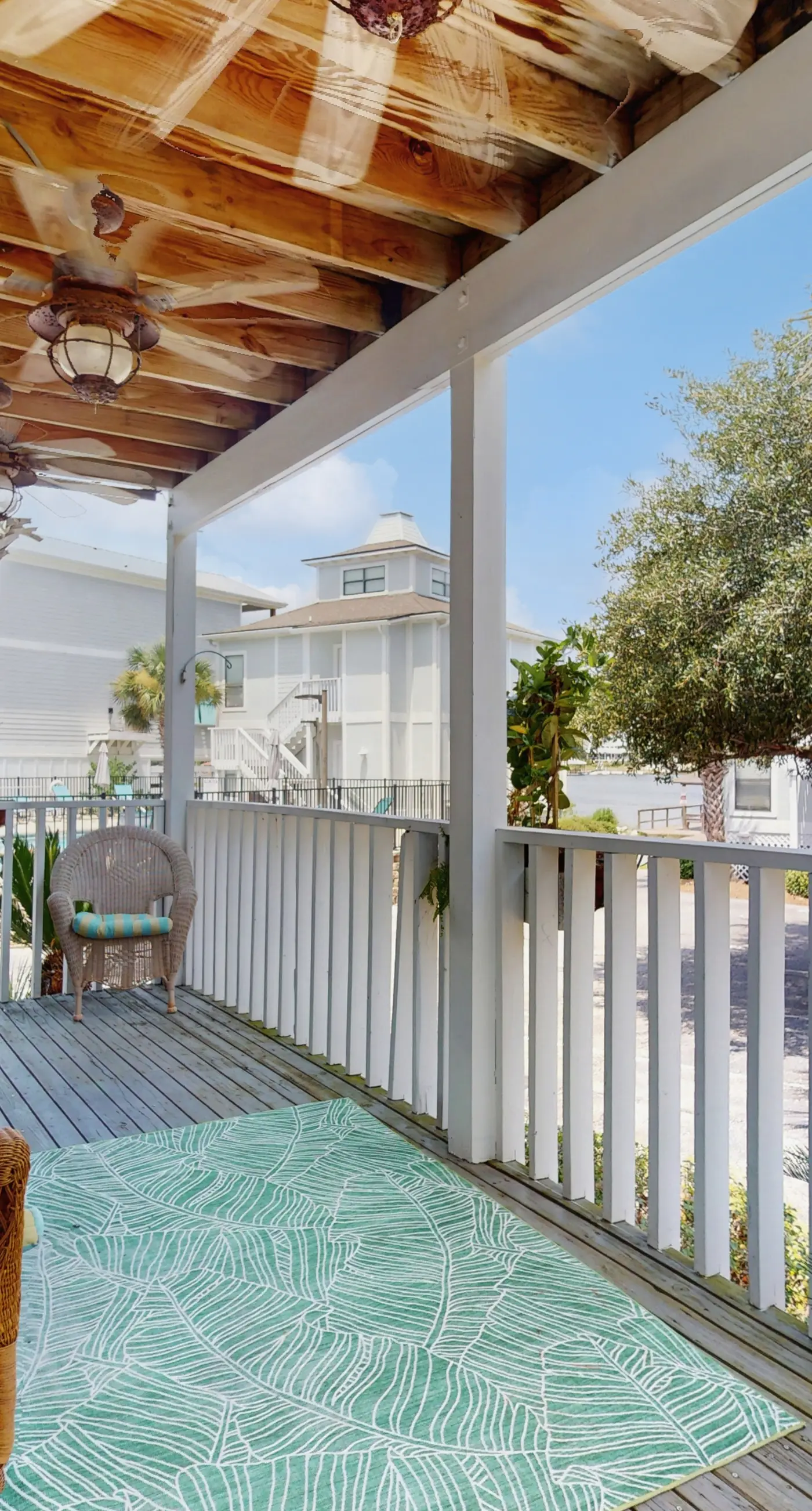 Gorgeous coastal townhome with private balcony/porch, W/D,  and shared pool