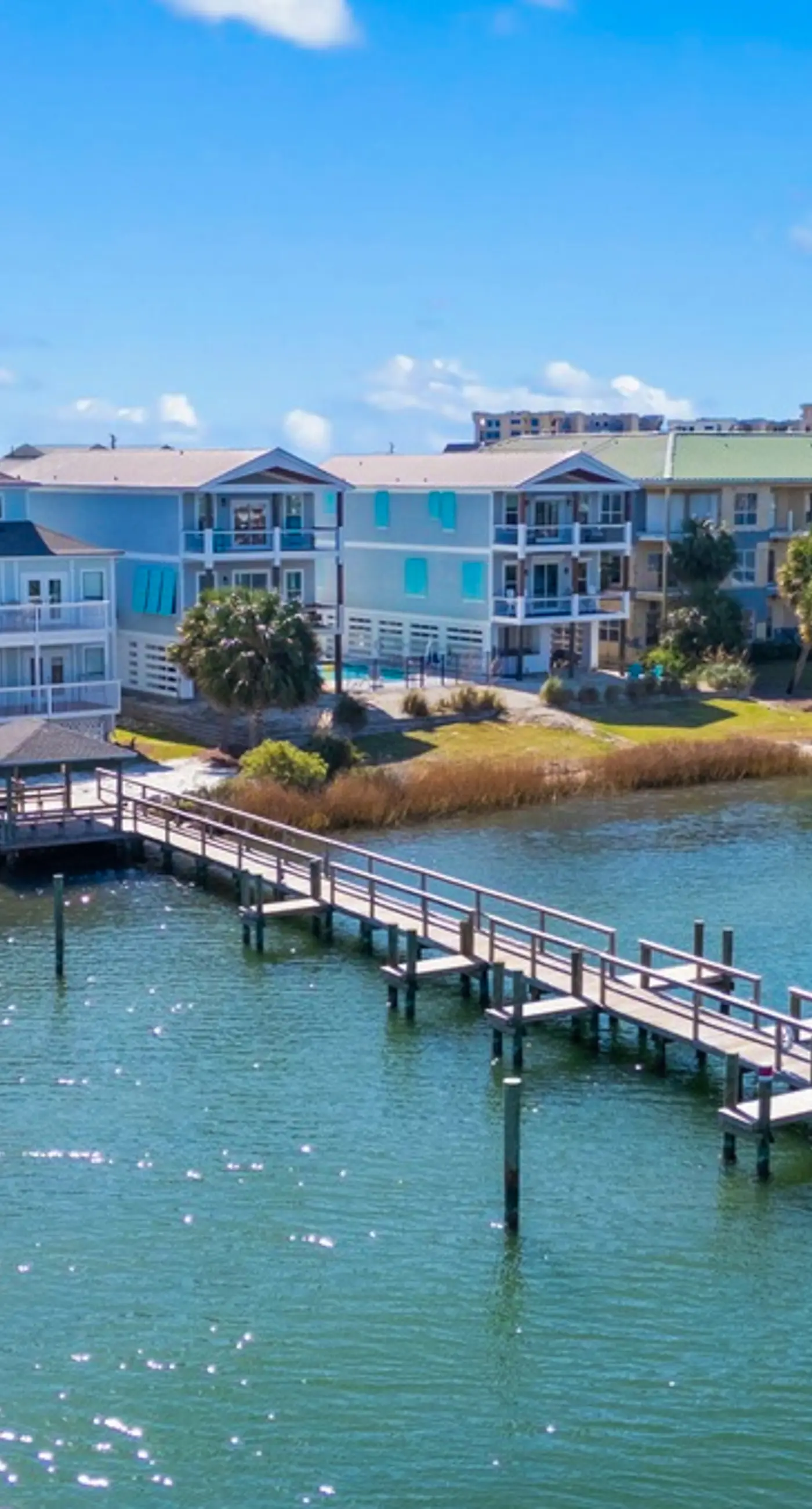 Gorgeous coastal townhome with private balcony/porch, W/D,  and shared pool