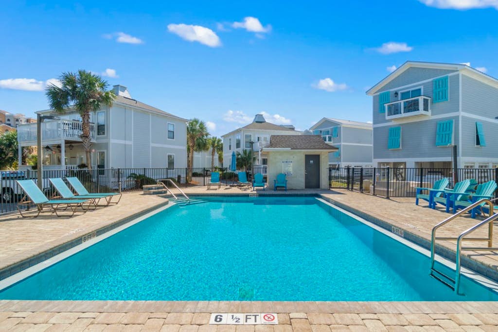 Gorgeous coastal townhome with private balcony/porch, W/D,  and shared pool