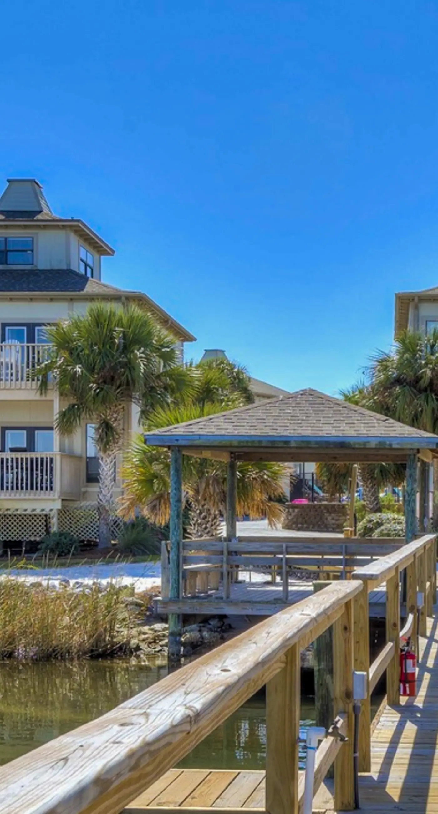 Gorgeous coastal townhome with private balcony/porch, W/D,  and shared pool