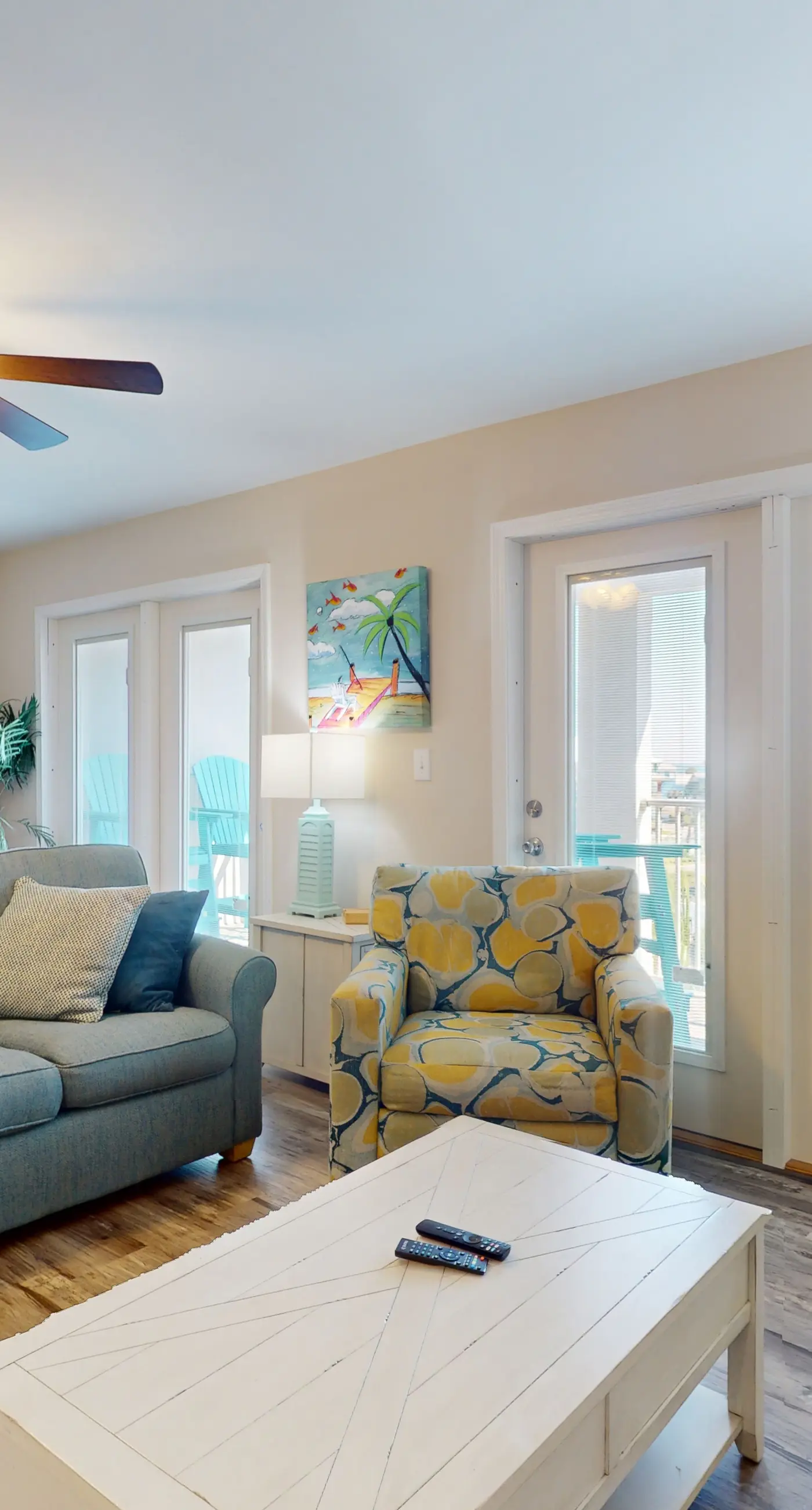 Airy coastal condo steps to the Gulf & quick drive to entertainment