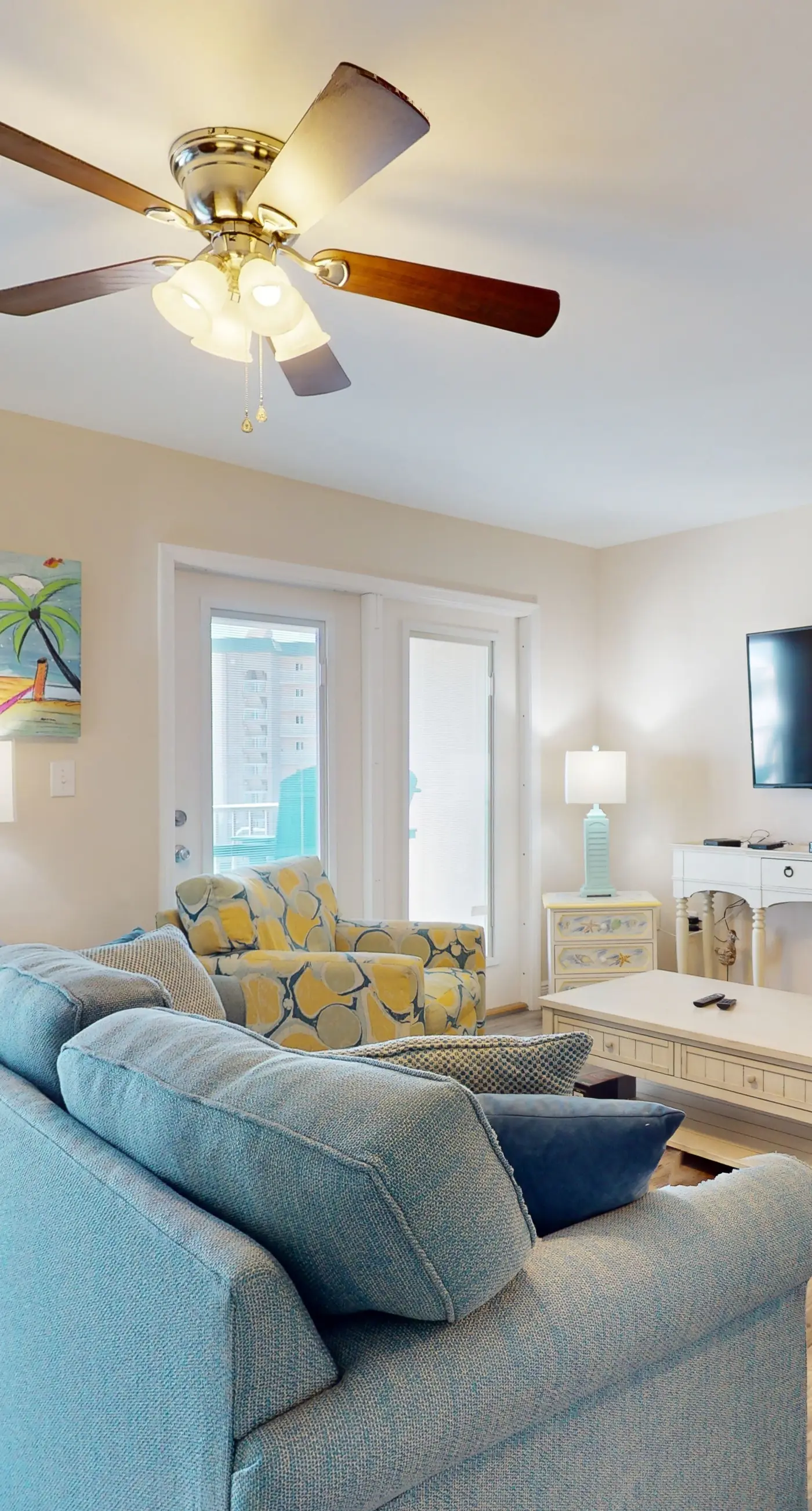 Airy coastal condo steps to the Gulf & quick drive to entertainment