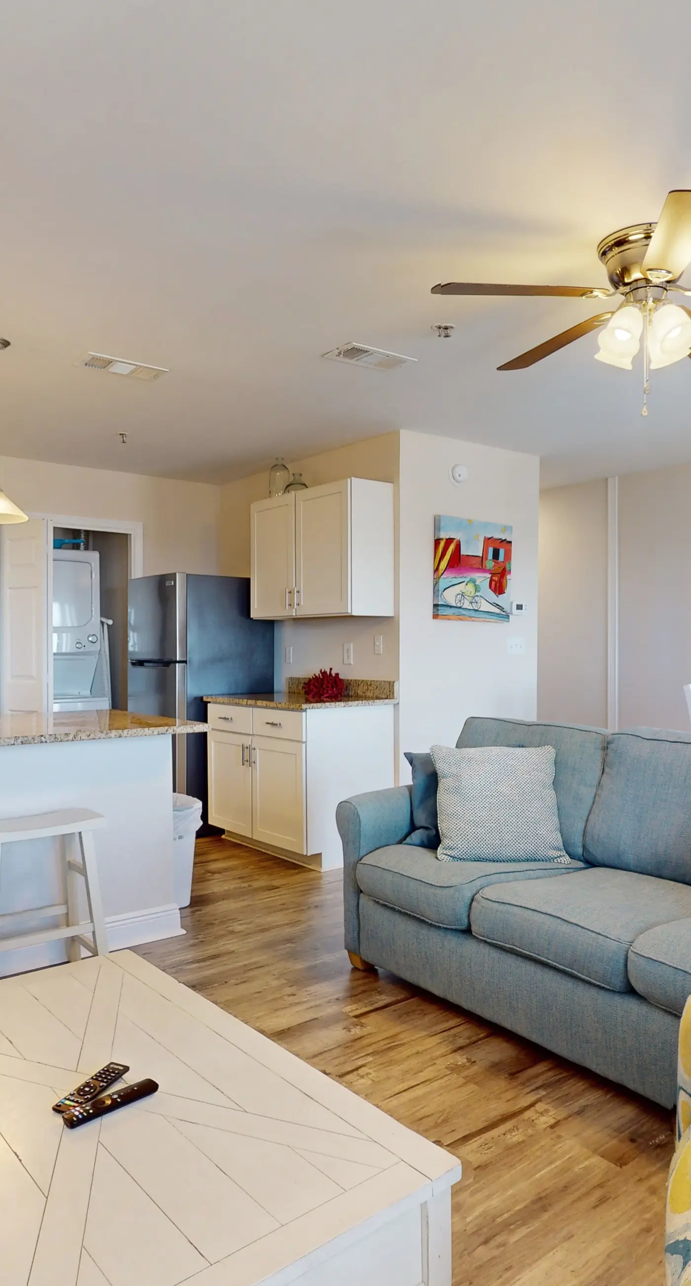 Airy coastal condo steps to the Gulf & quick drive to entertainment