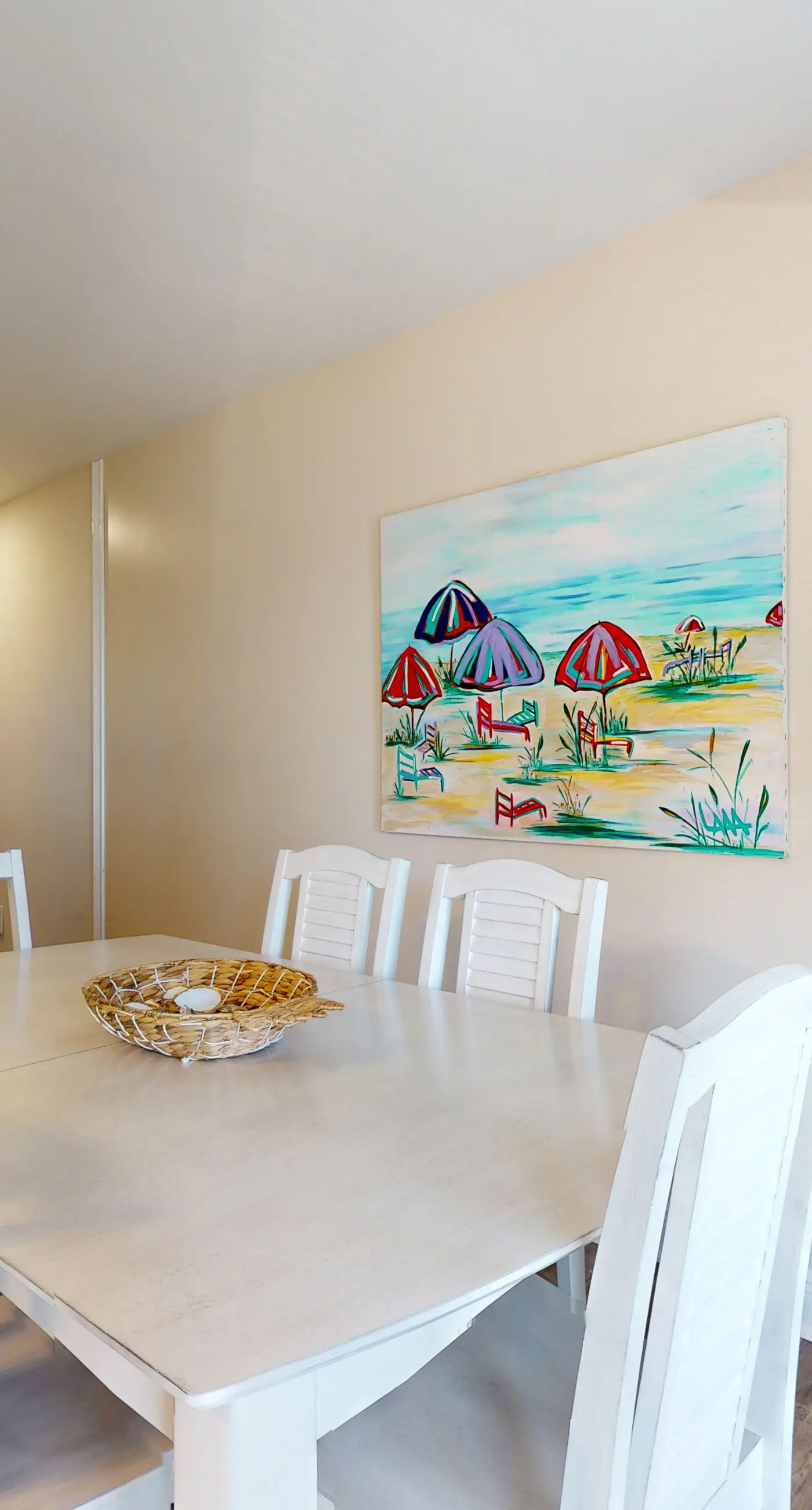 Airy coastal condo steps to the Gulf & quick drive to entertainment