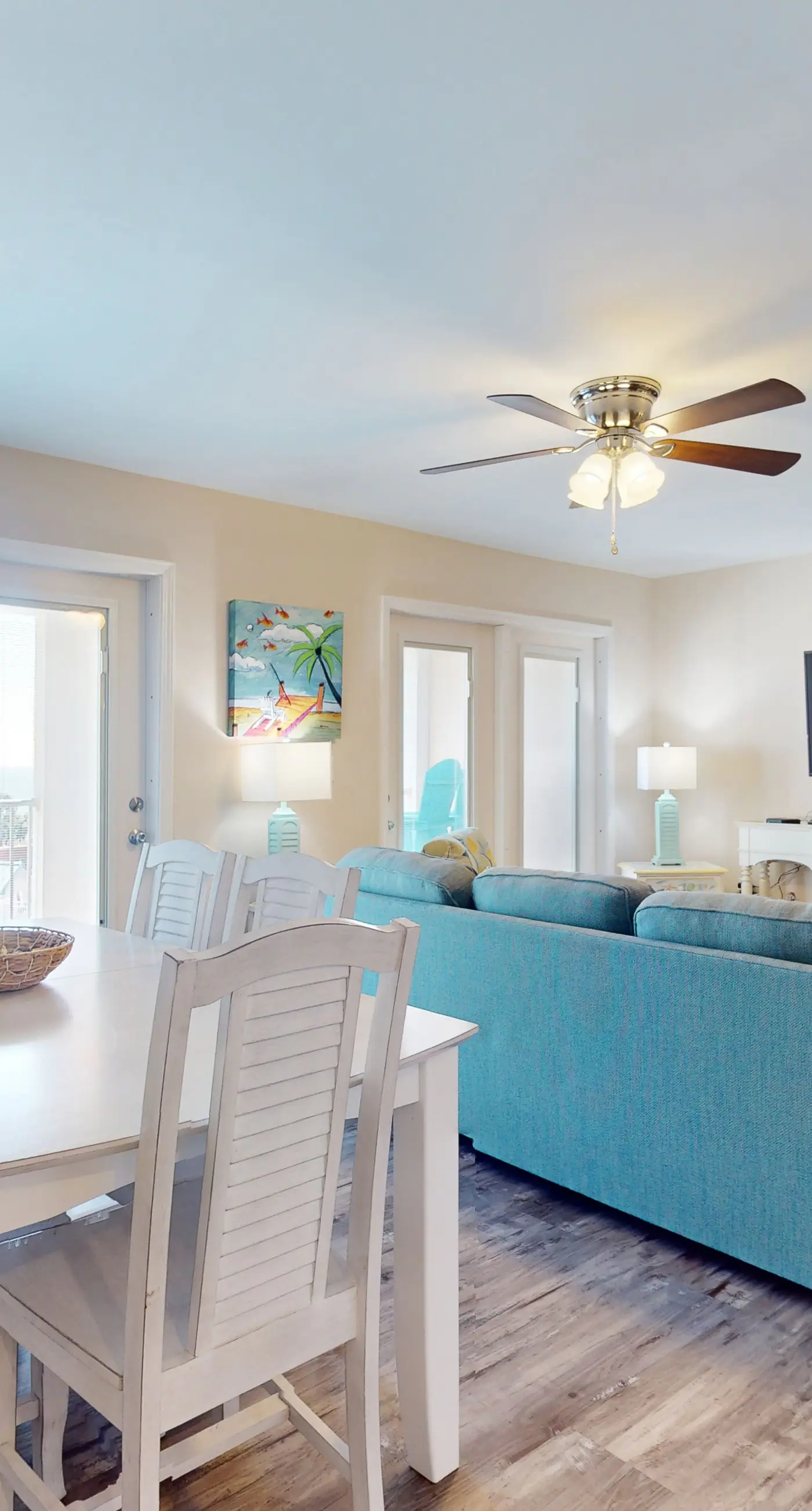 Airy coastal condo steps to the Gulf & quick drive to entertainment