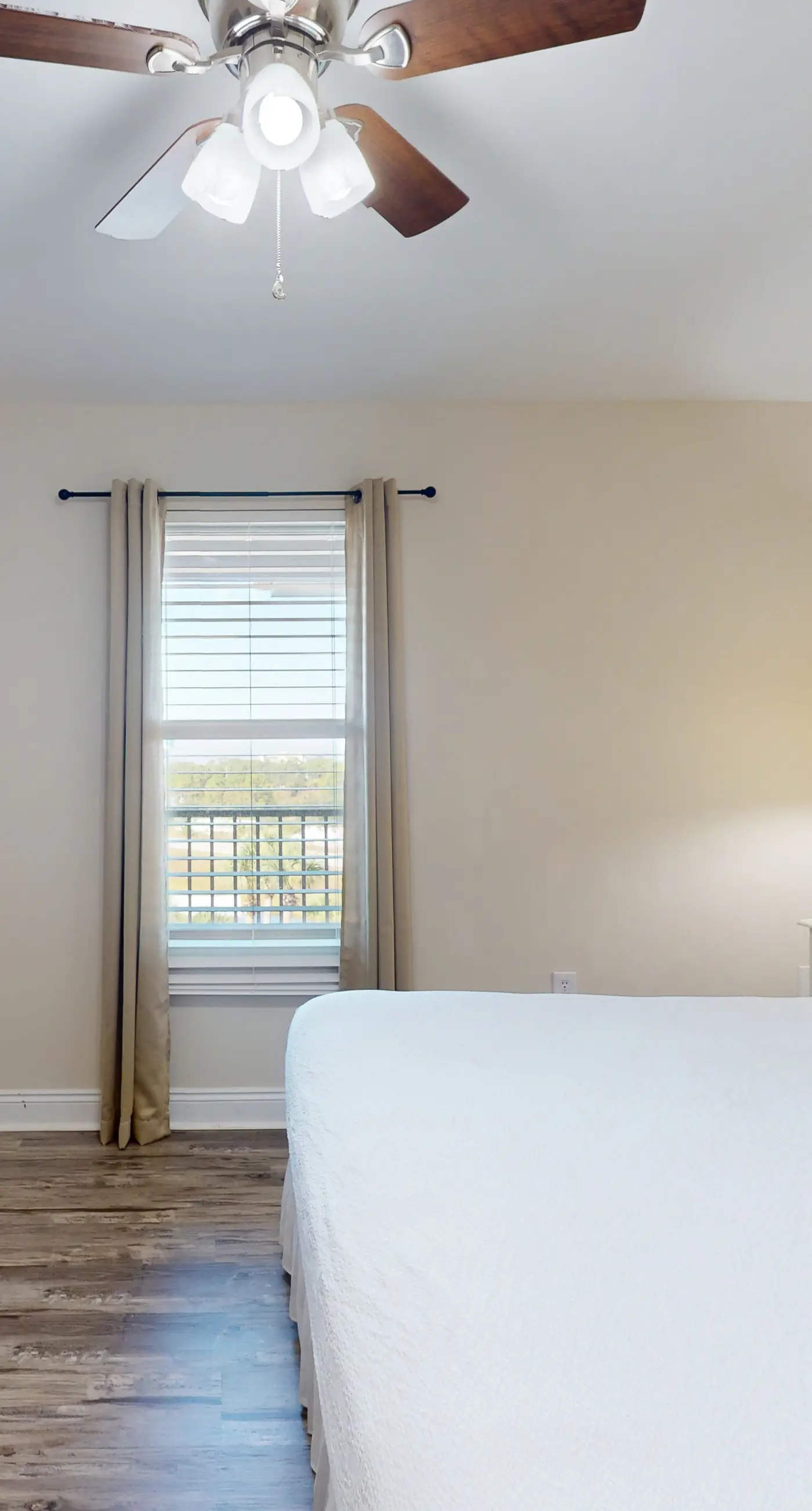 Airy coastal condo steps to the Gulf & quick drive to entertainment