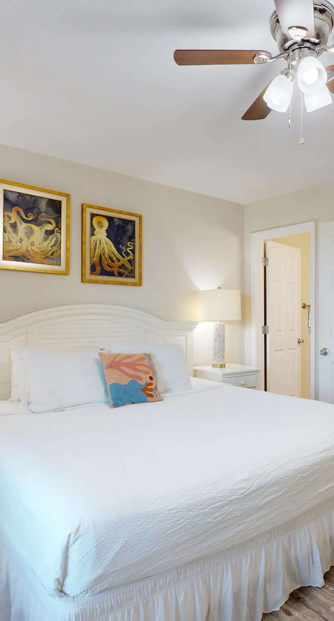 Airy coastal condo steps to the Gulf & quick drive to entertainment