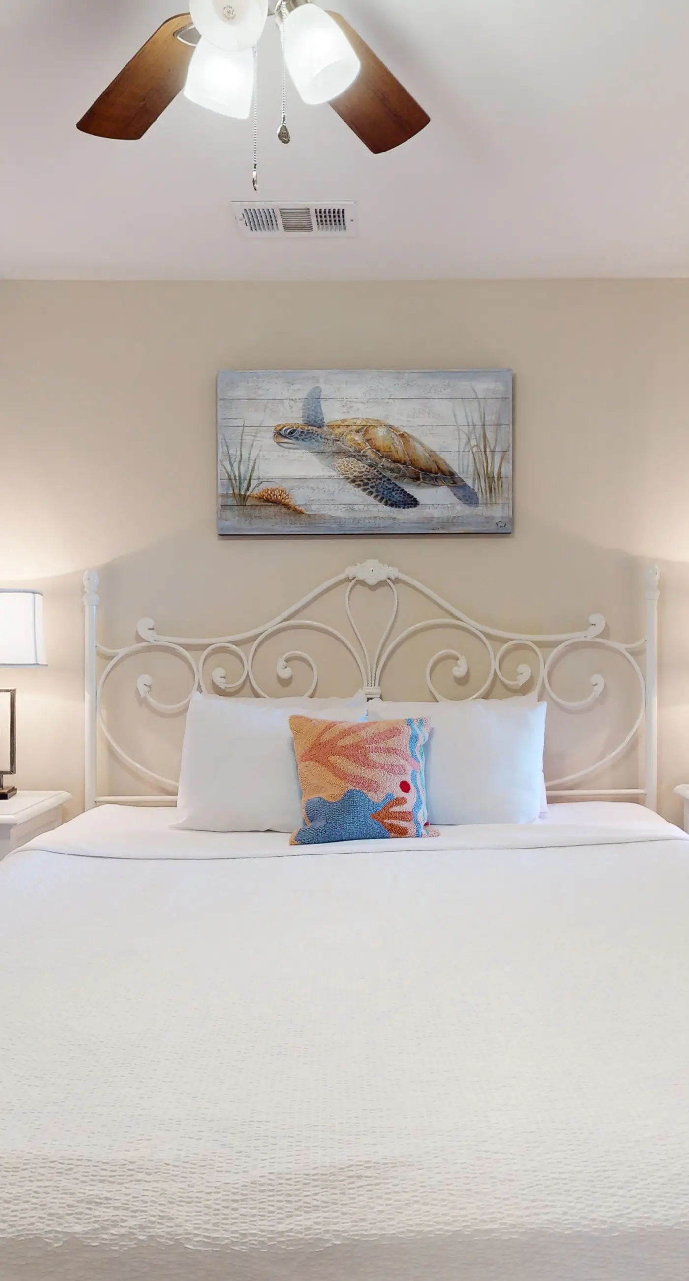 Airy coastal condo steps to the Gulf & quick drive to entertainment