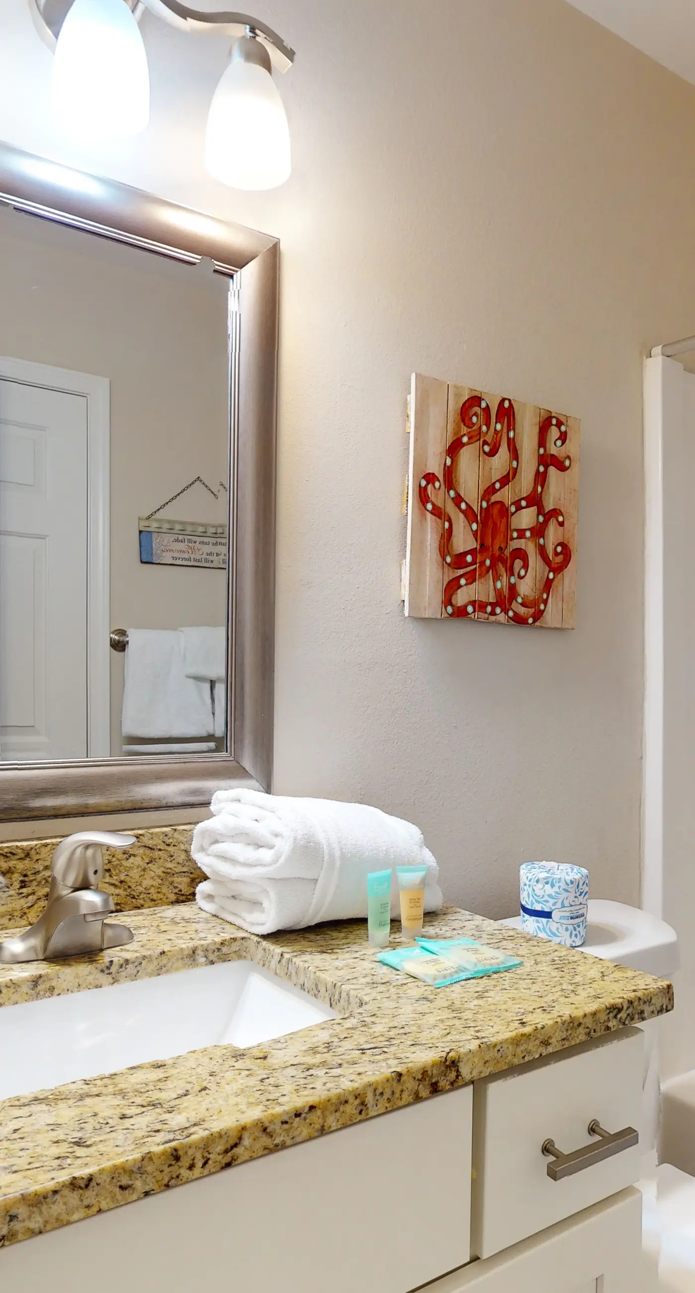 Airy coastal condo steps to the Gulf & quick drive to entertainment